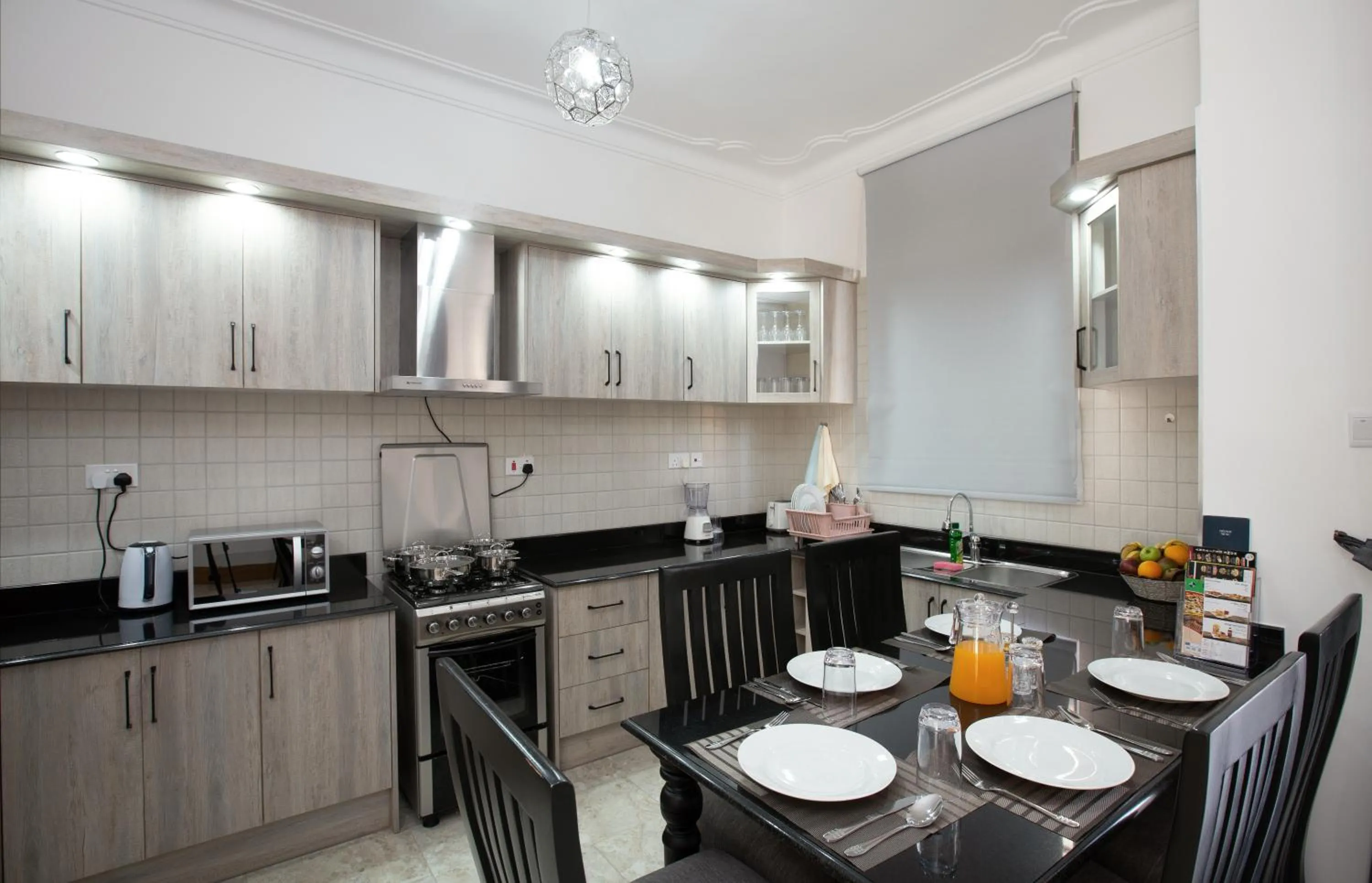 Kitchen or kitchenette in Caran Apartments