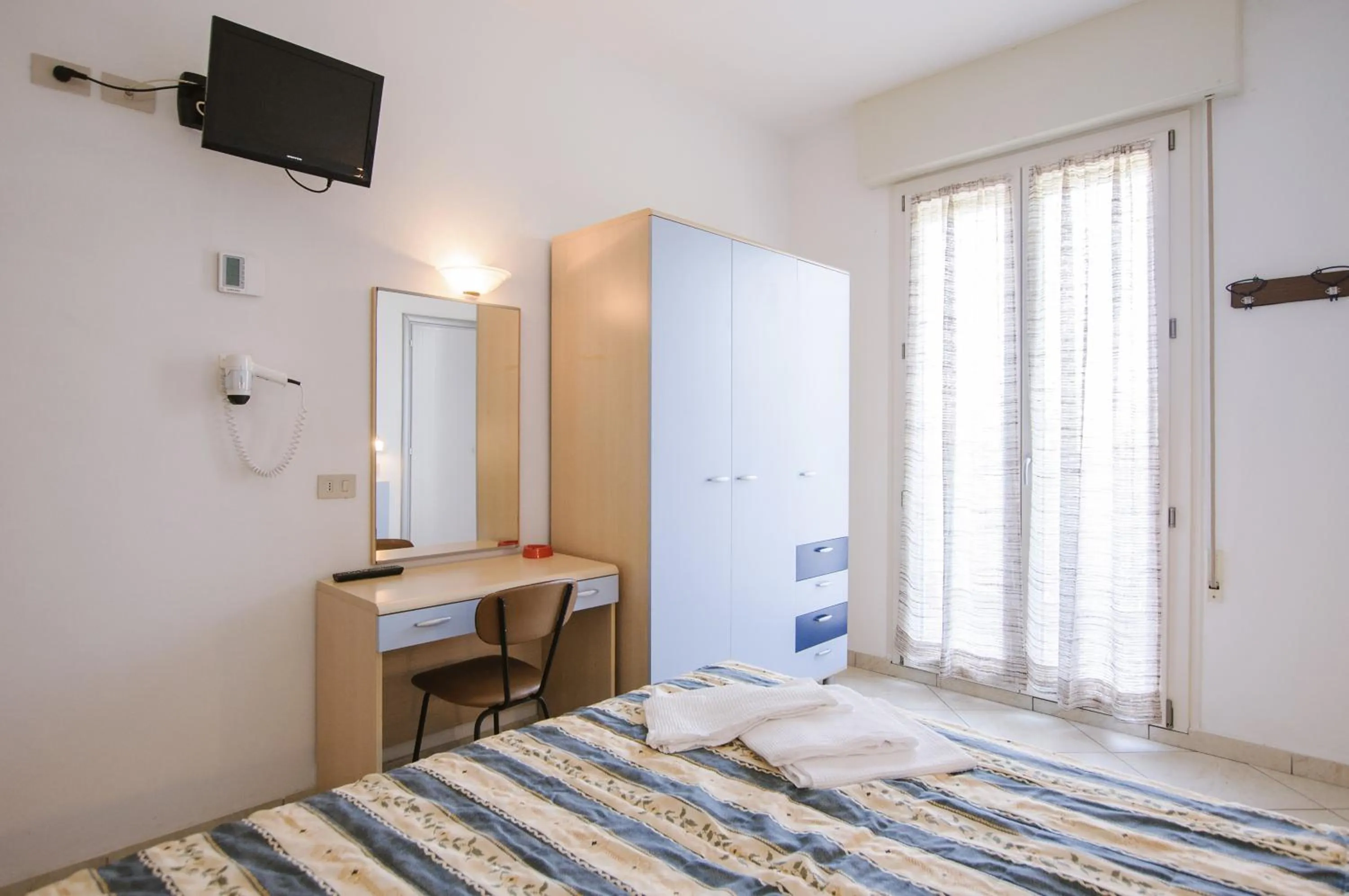 Communal lounge/ TV room in Hotel Edelweiss