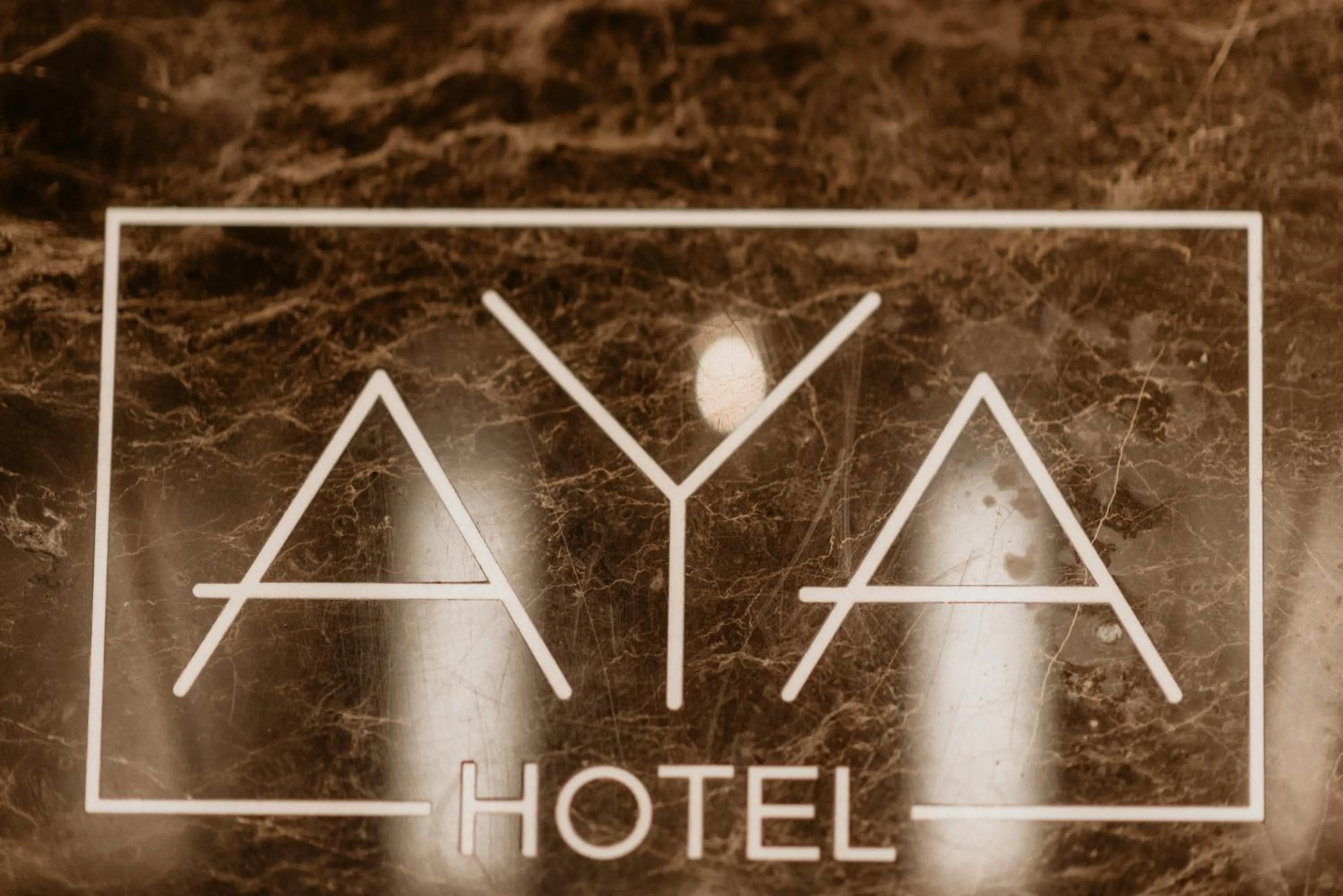 Property logo or sign in Aya Hotel