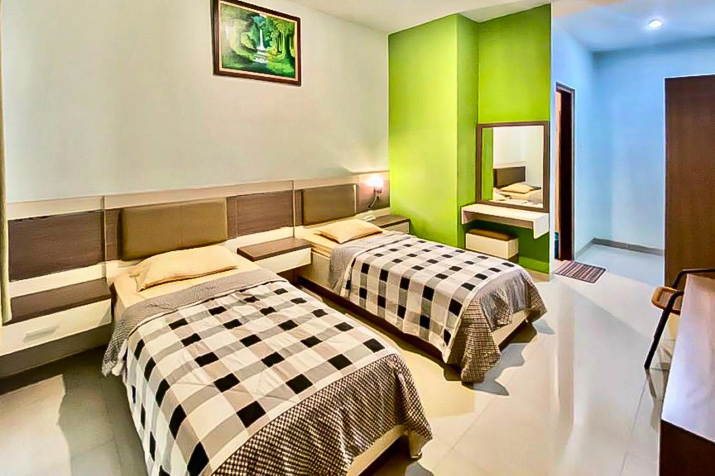 Bedroom, Bed in Mawar Indah Hotel near Stasiun Balapan Solo Mitra RedDoorz
