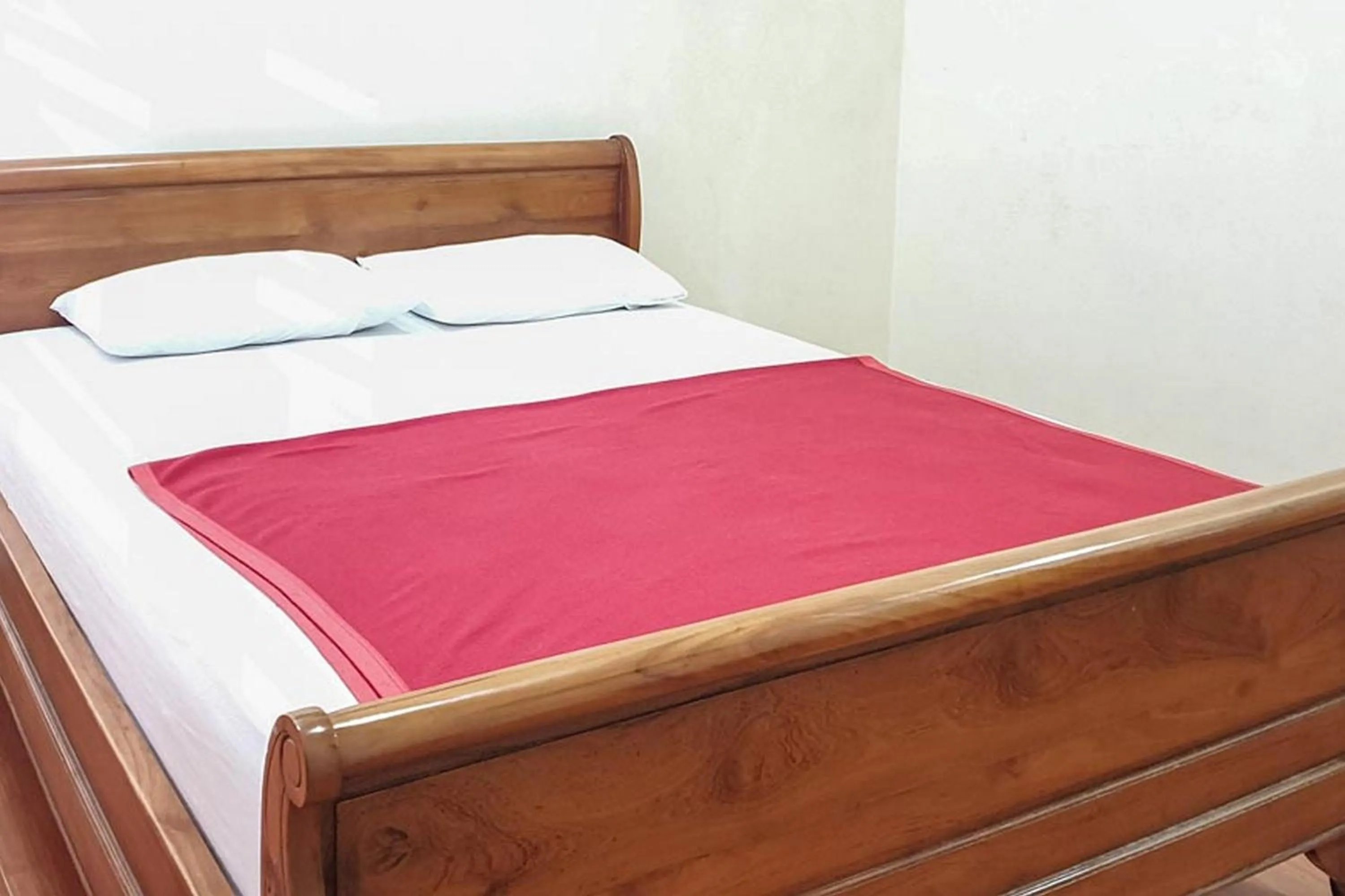 Bed in Hotel Bumi Bermi Permai near Bermi Eco Park Mitra RedDoorz