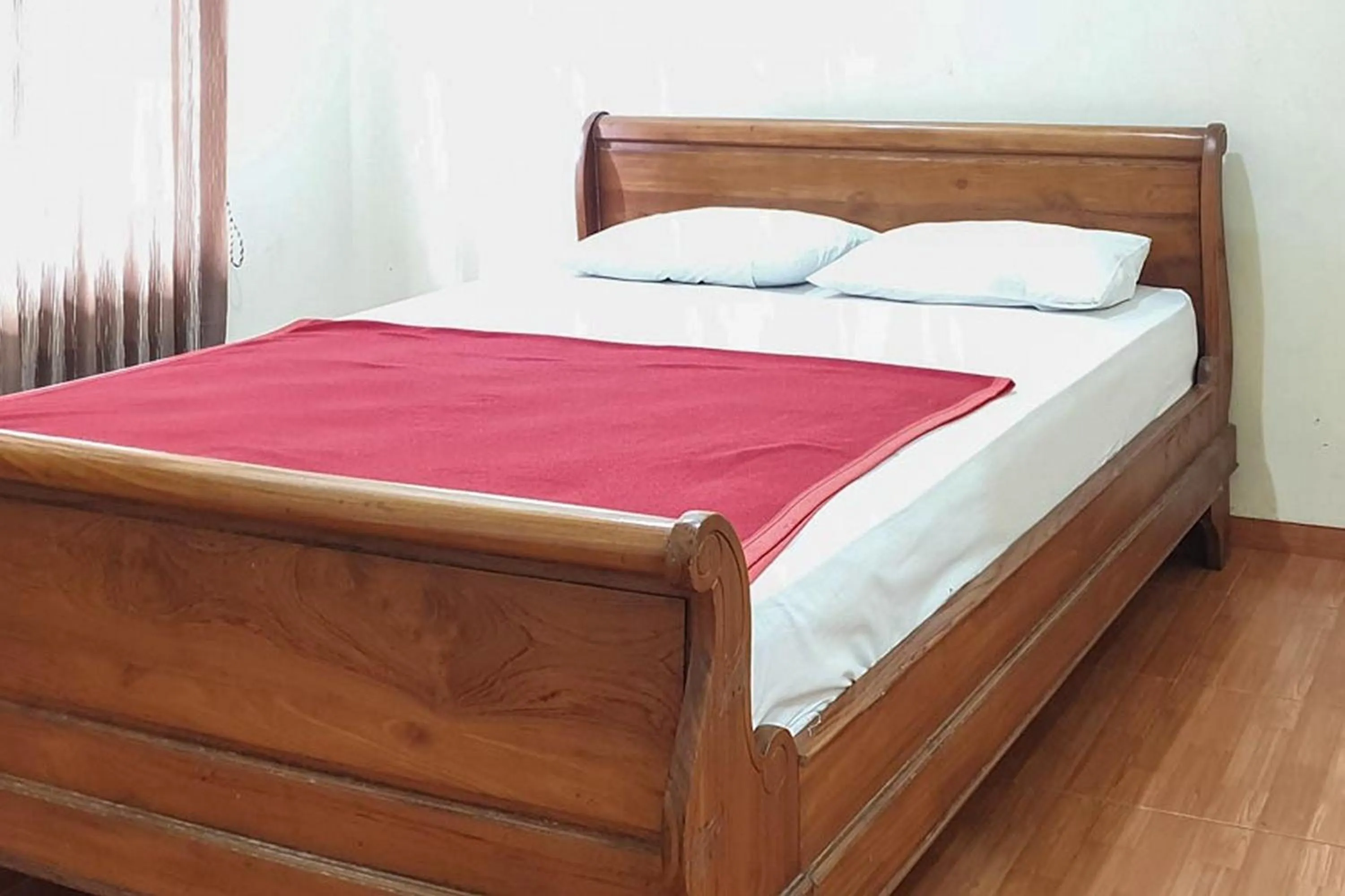 Bed in Hotel Bumi Bermi Permai near Bermi Eco Park Mitra RedDoorz