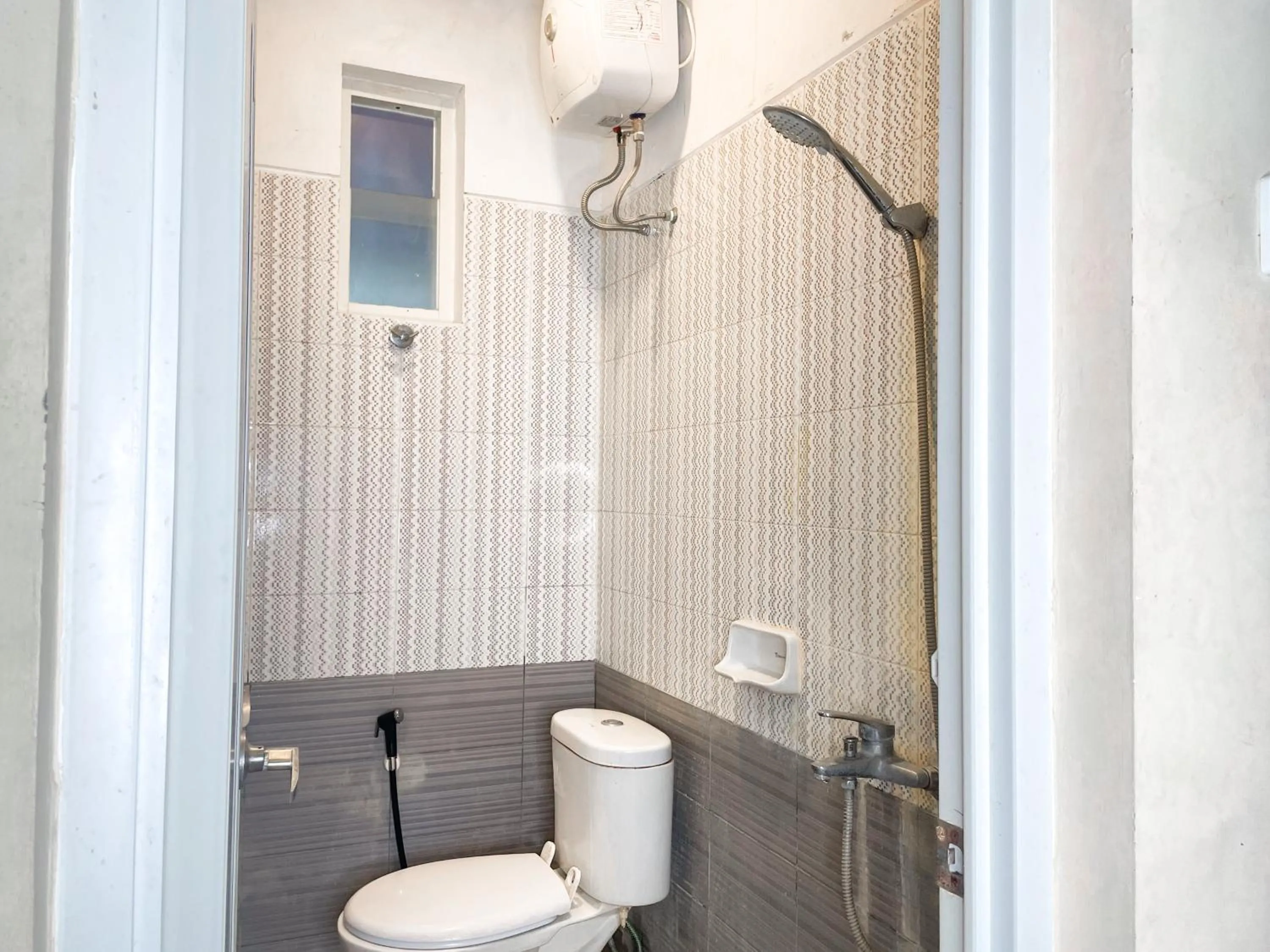 Bathroom in Hotel O Kate'el Inn