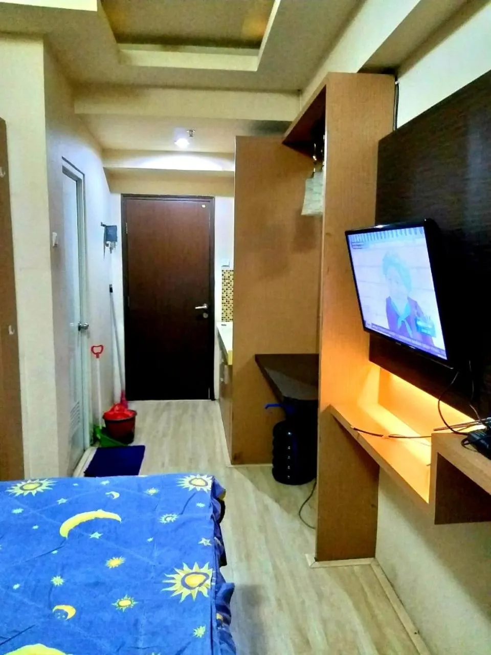 TV and multimedia, Bed in The Suites Metro by Faris Property