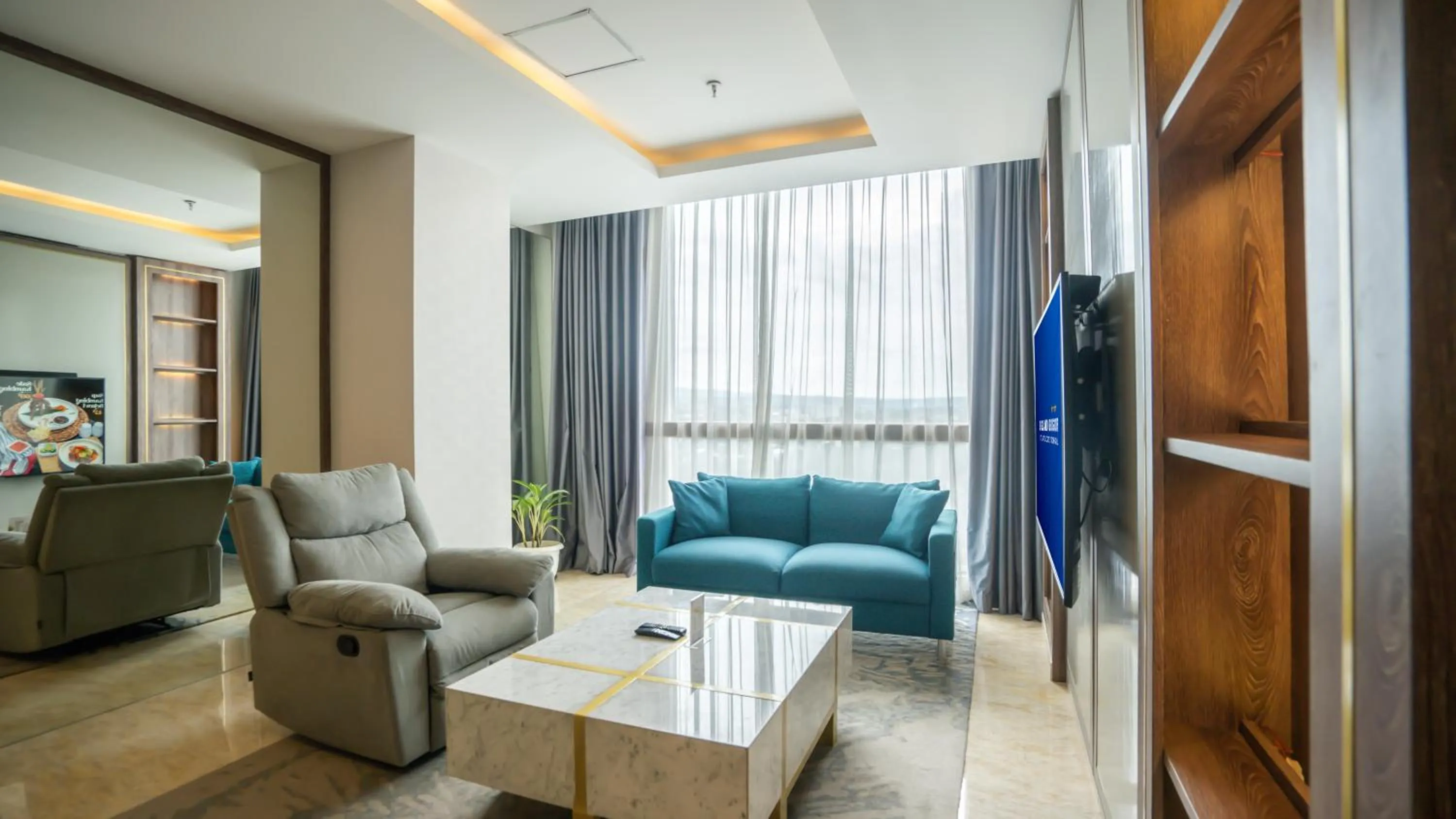 Living room in Bigland Bogor Hotel Powered by Archipelago