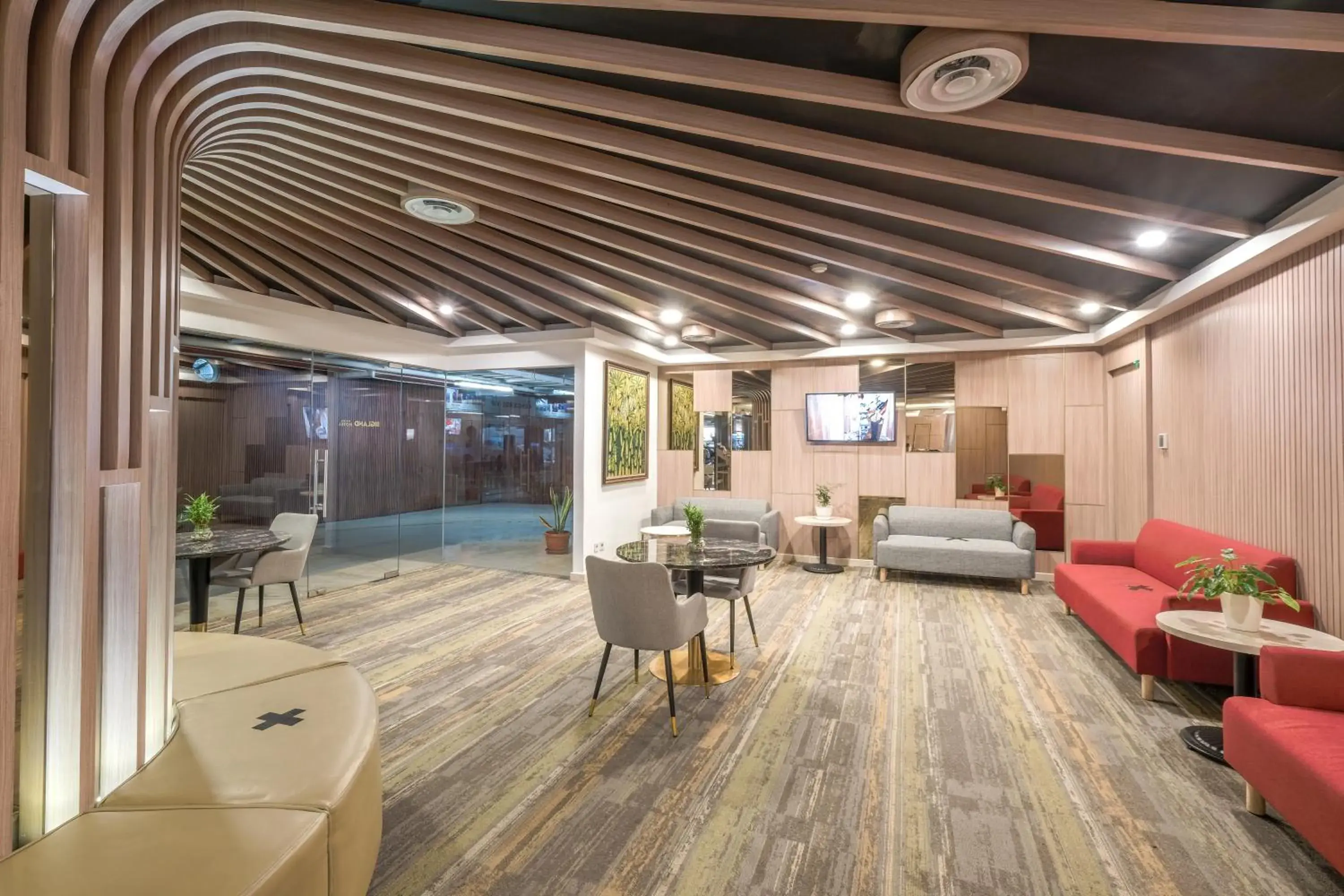 Lobby or reception in Bigland Bogor Hotel Powered by Archipelago Lobby or reception in Bigland Bogor Hotel Powered by Archipelago