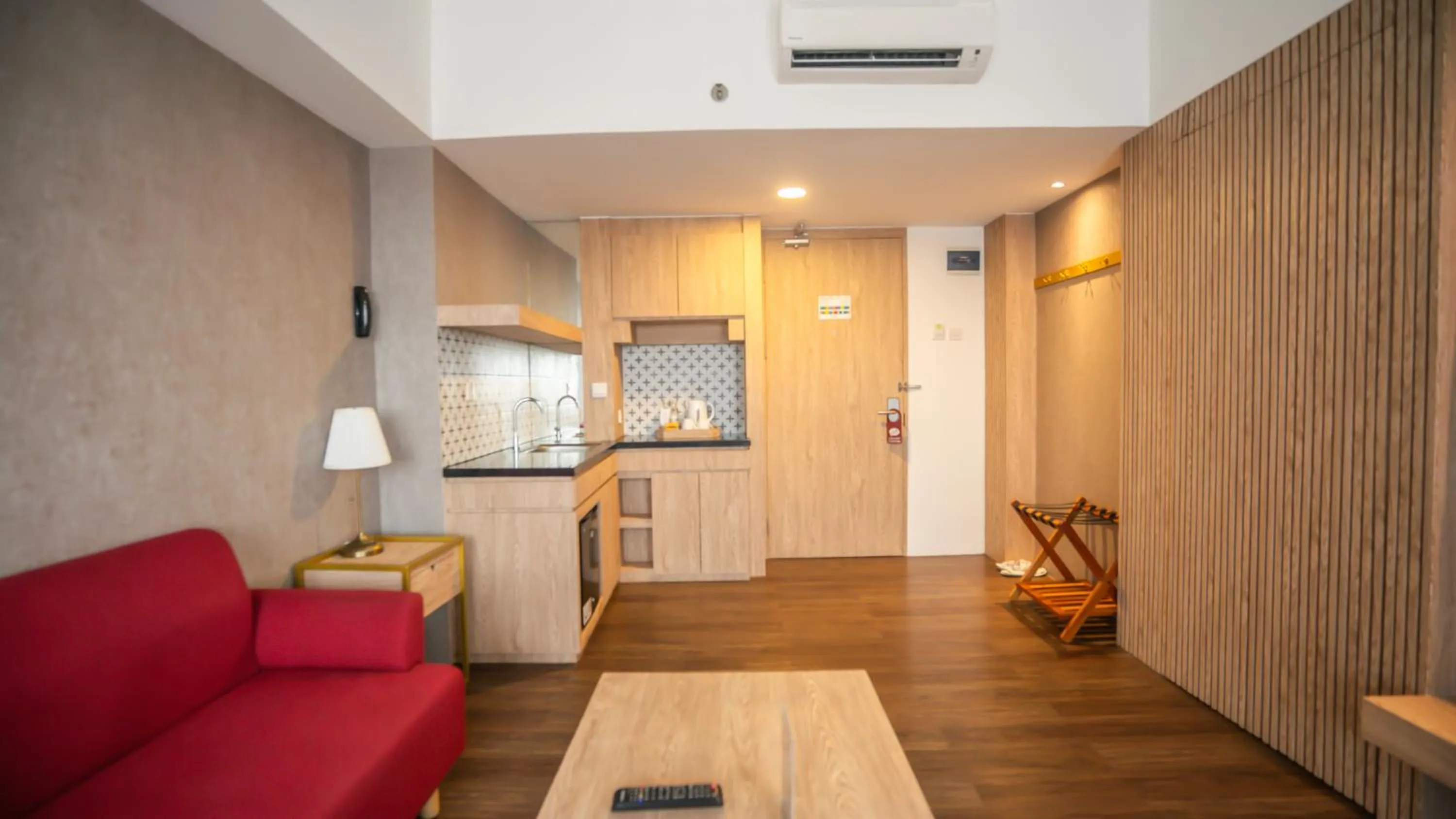 Living room in Bigland Bogor Hotel Powered by Archipelago