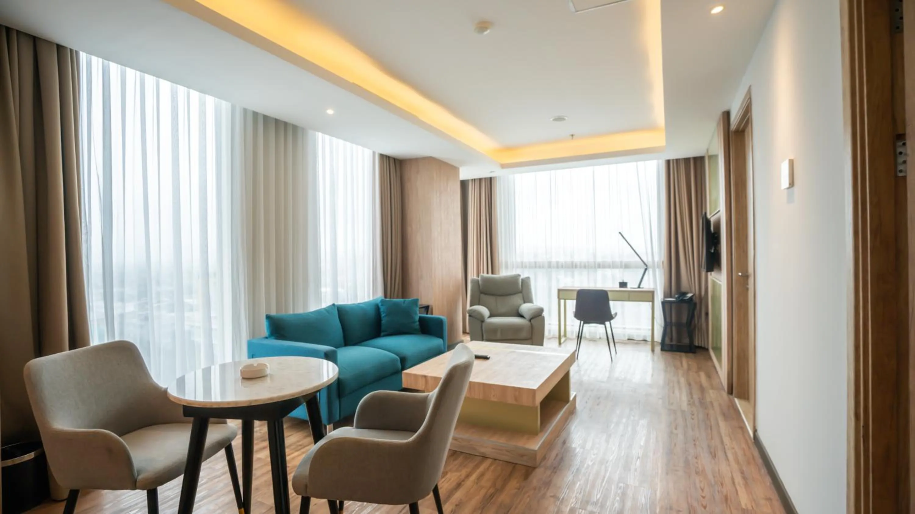 Living room in Bigland Bogor Hotel Powered by Archipelago