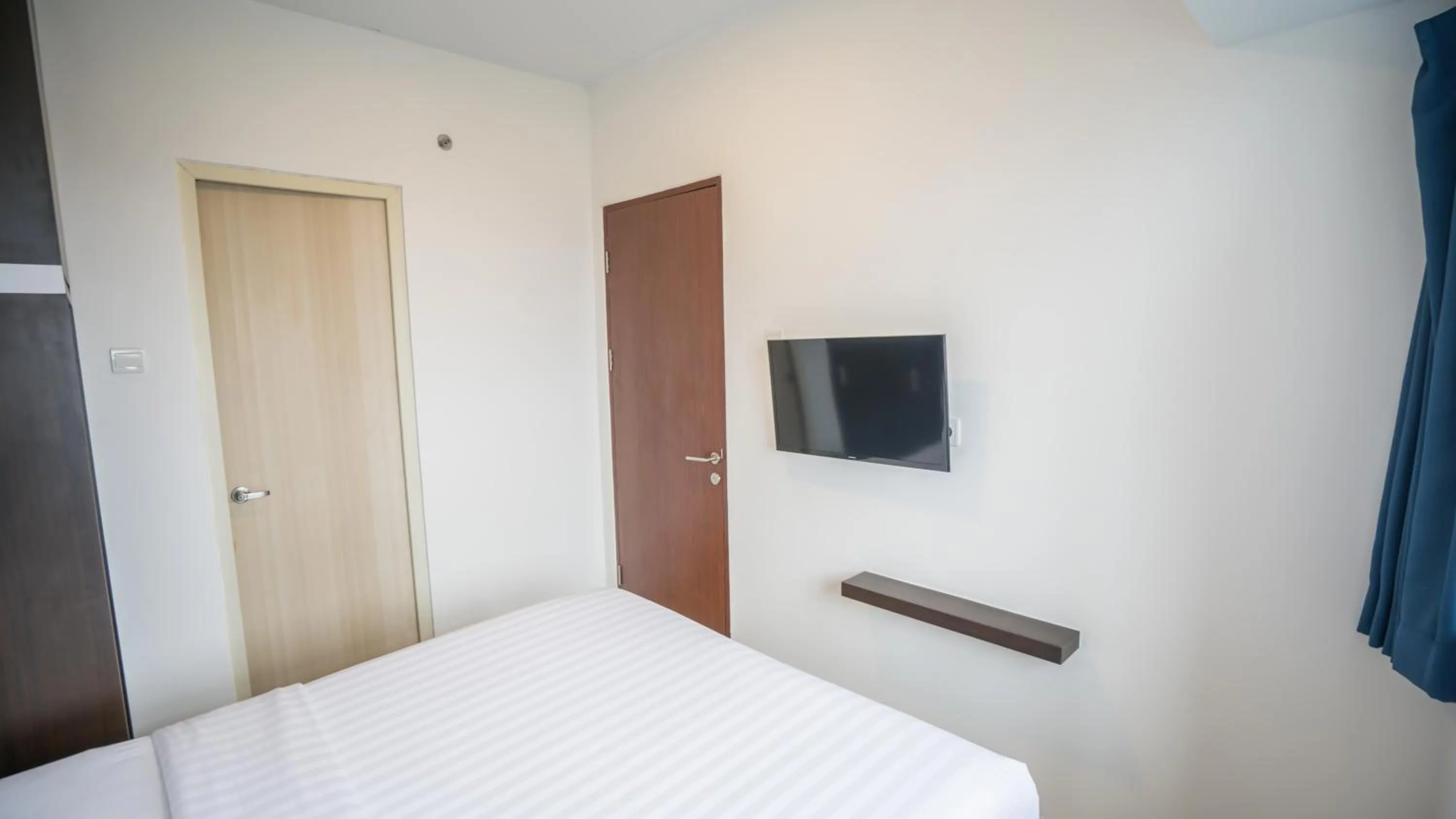 Bed in Bigland Bogor Hotel Powered by Archipelago
