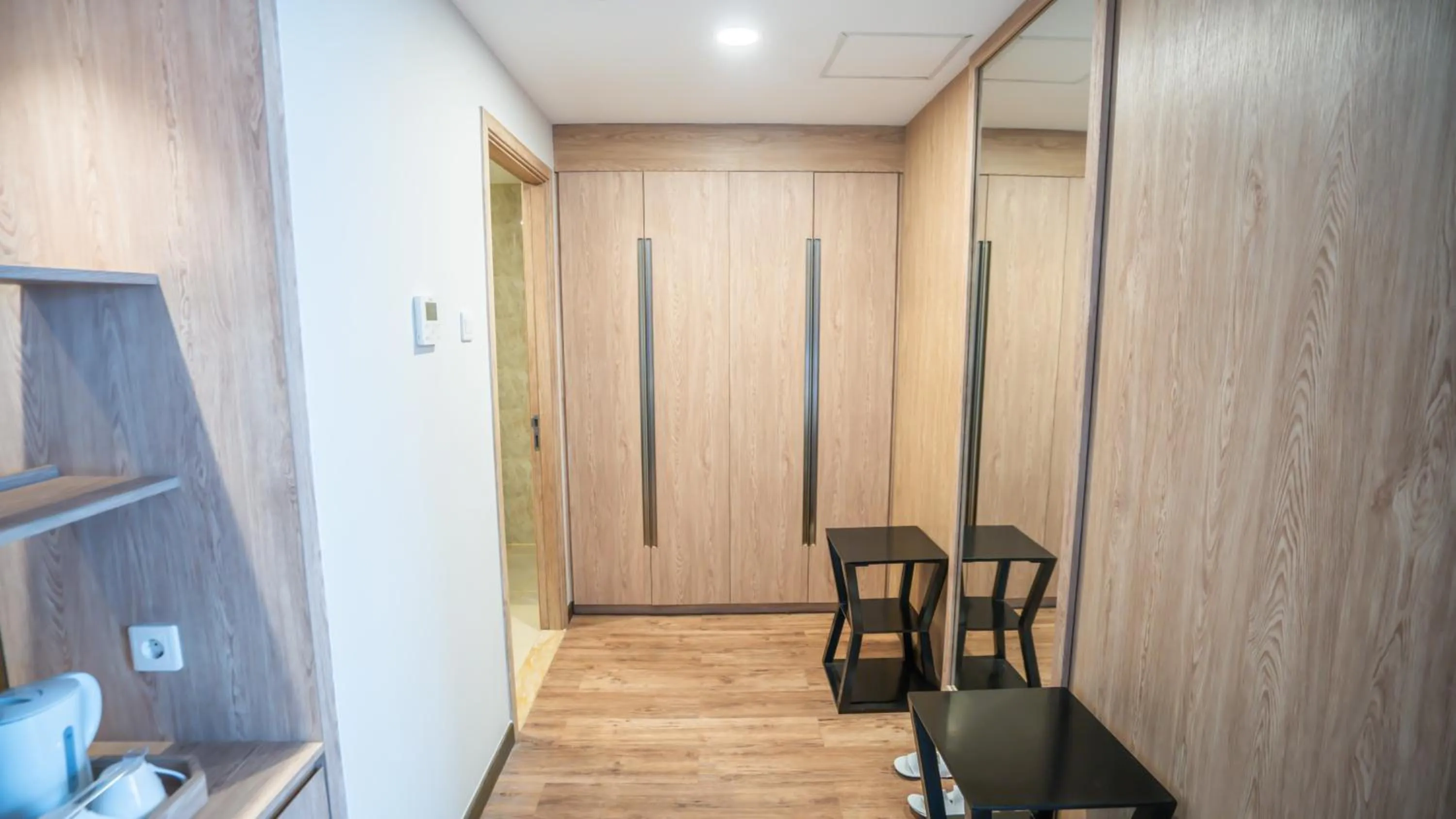 wardrobe in Bigland Bogor Hotel Powered by Archipelago