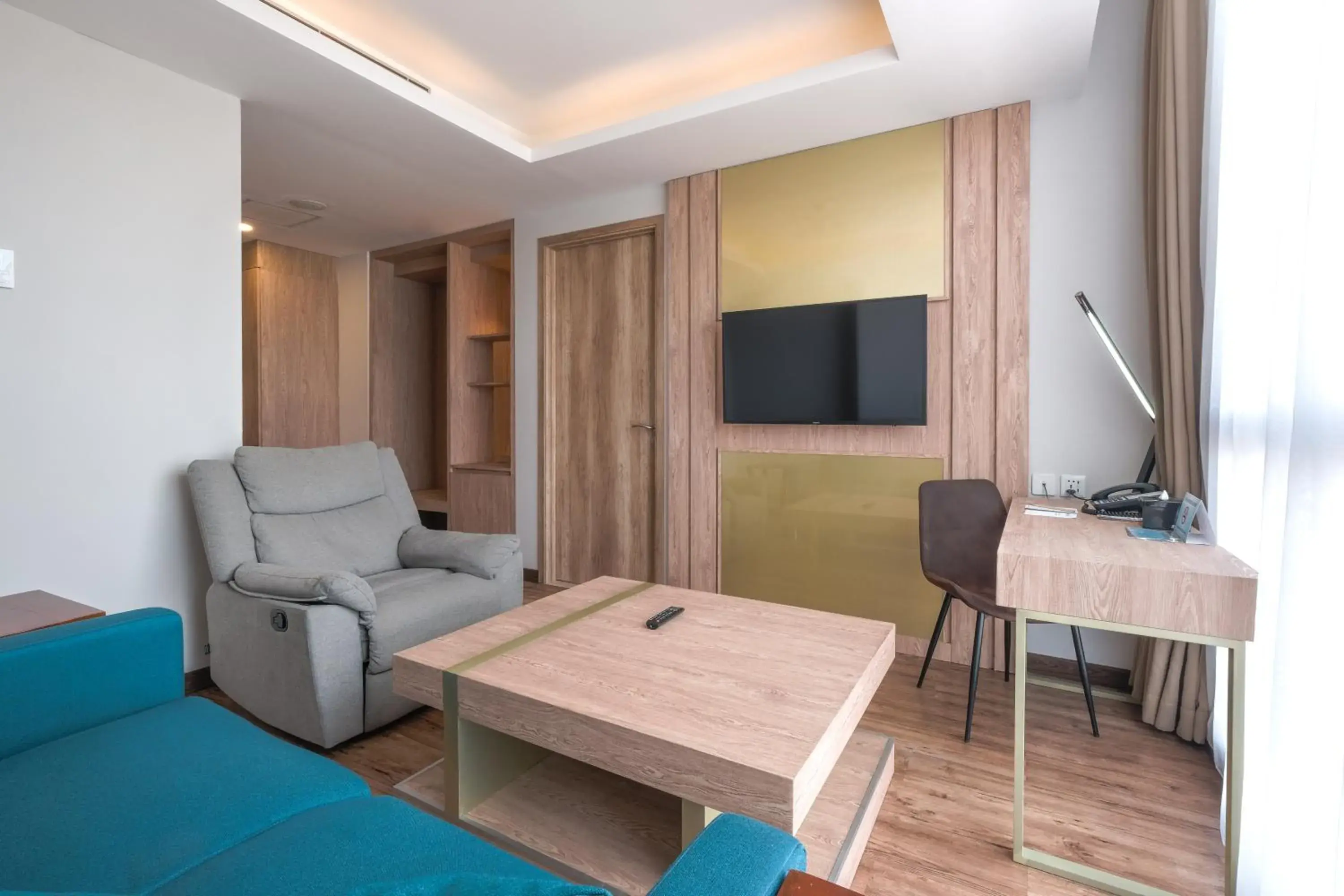 Living room in Bigland Bogor Hotel Powered by Archipelago Living room in Bigland Bogor Hotel Powered by Archipelago