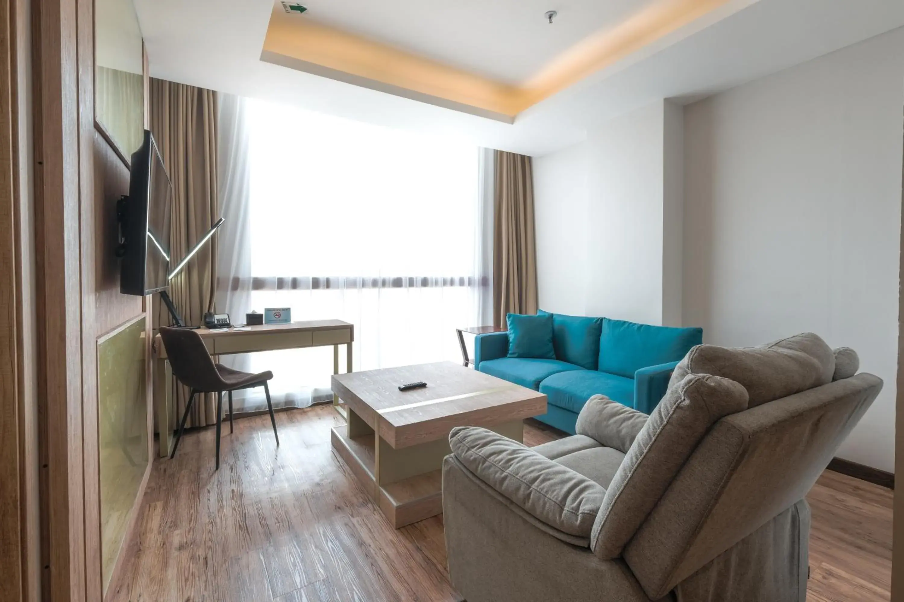 Living room in Bigland Bogor Hotel Powered by Archipelago Living room in Bigland Bogor Hotel Powered by Archipelago