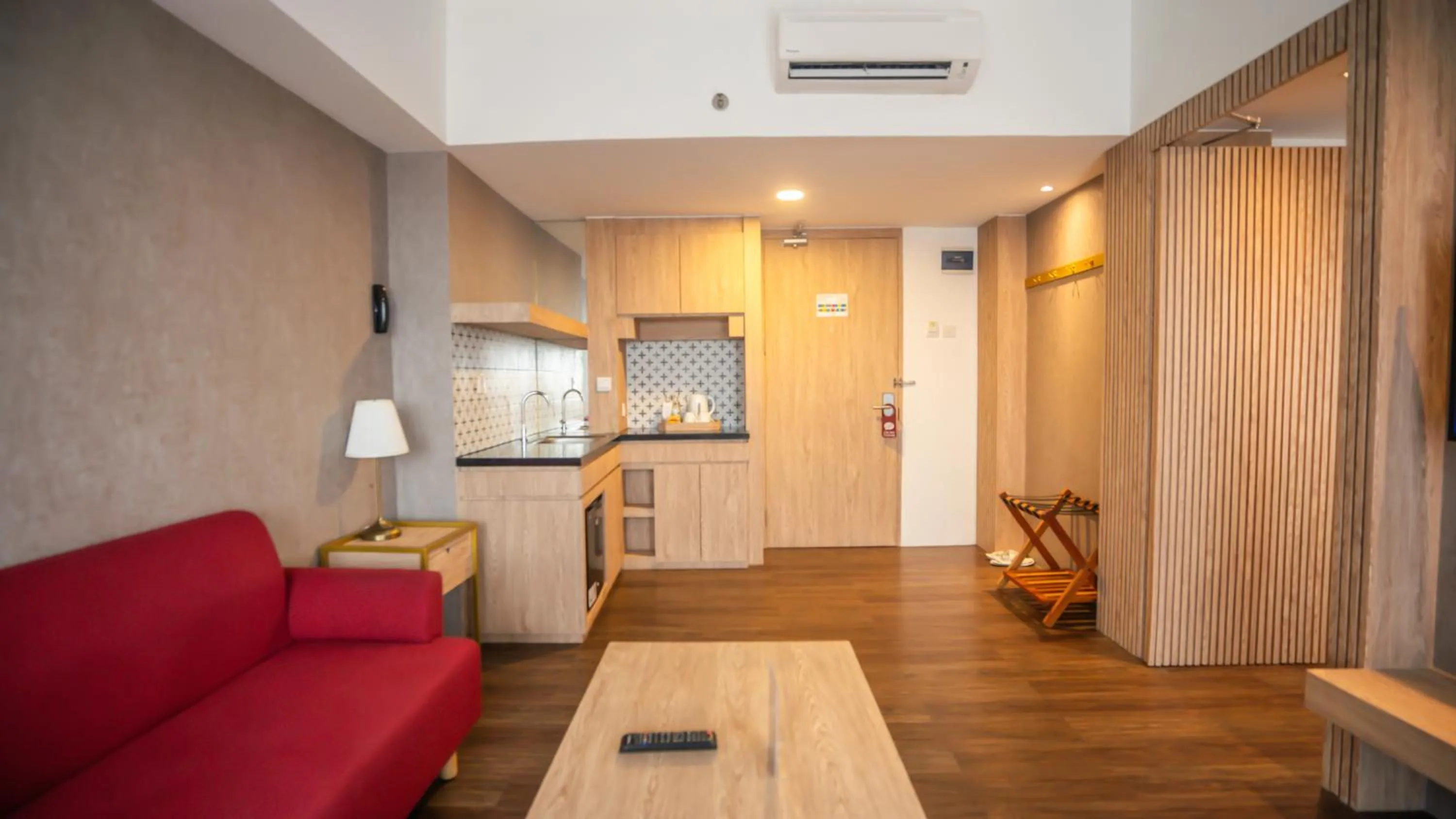 Living room in Bigland Bogor Hotel Powered by Archipelago