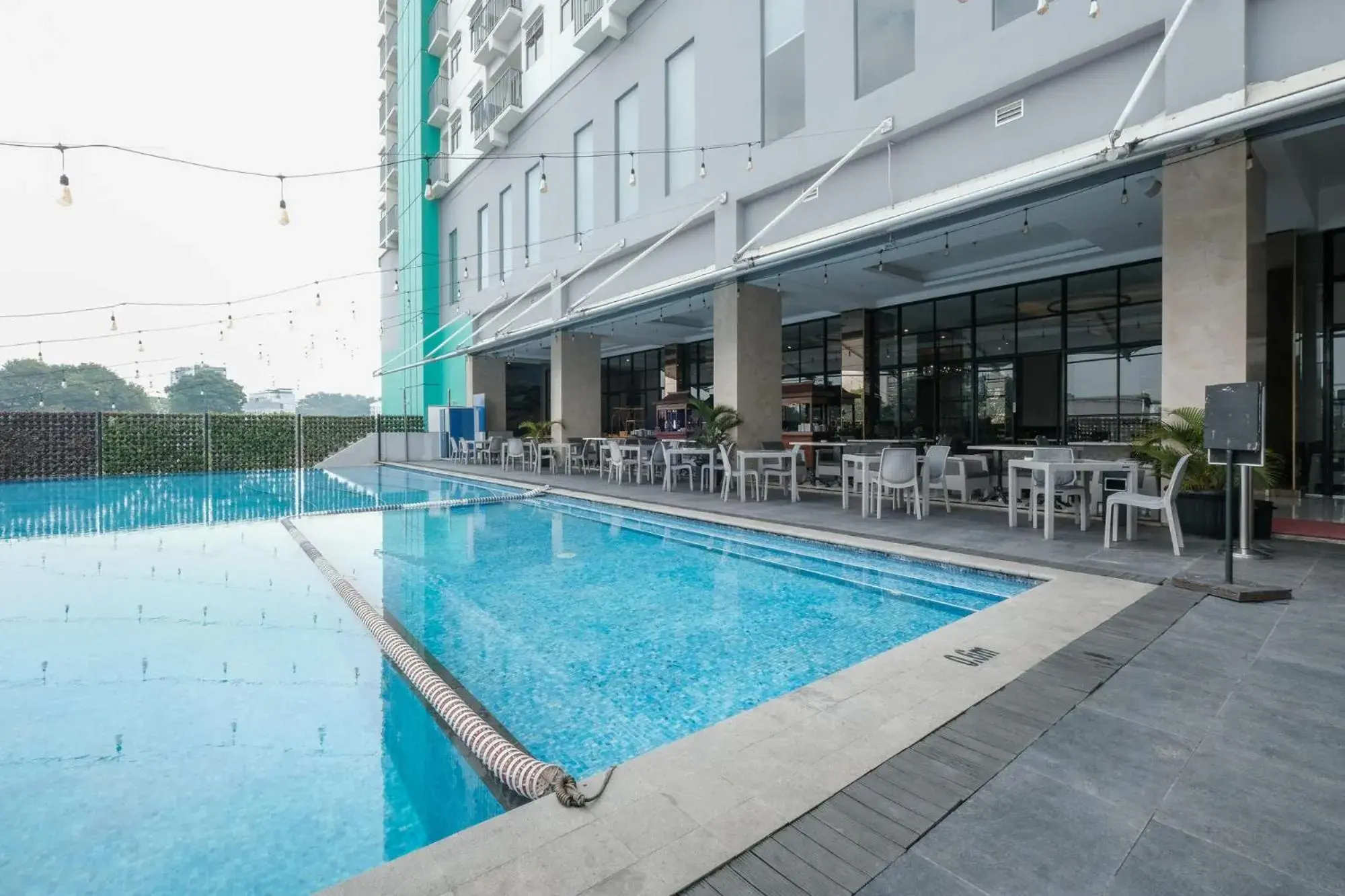 Swimming pool in Bigland Bogor Hotel Powered by Archipelago Swimming pool in Bigland Bogor Hotel Powered by Archipelago