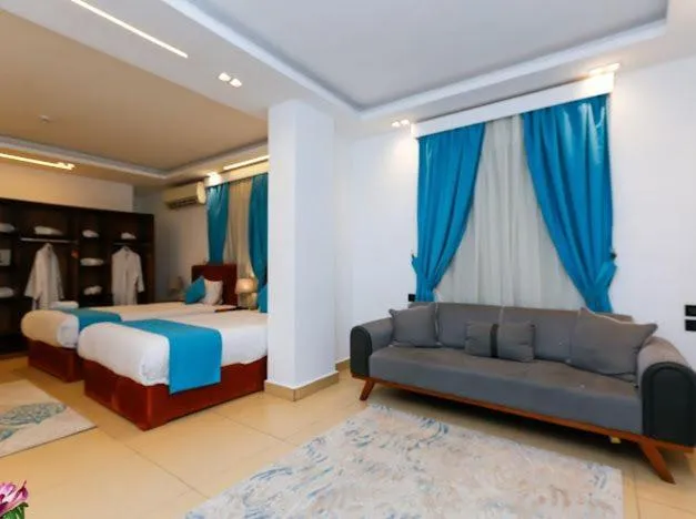 Living room, Bed in Pyramids Gem Plaza Boutique Hotel & Restaurant