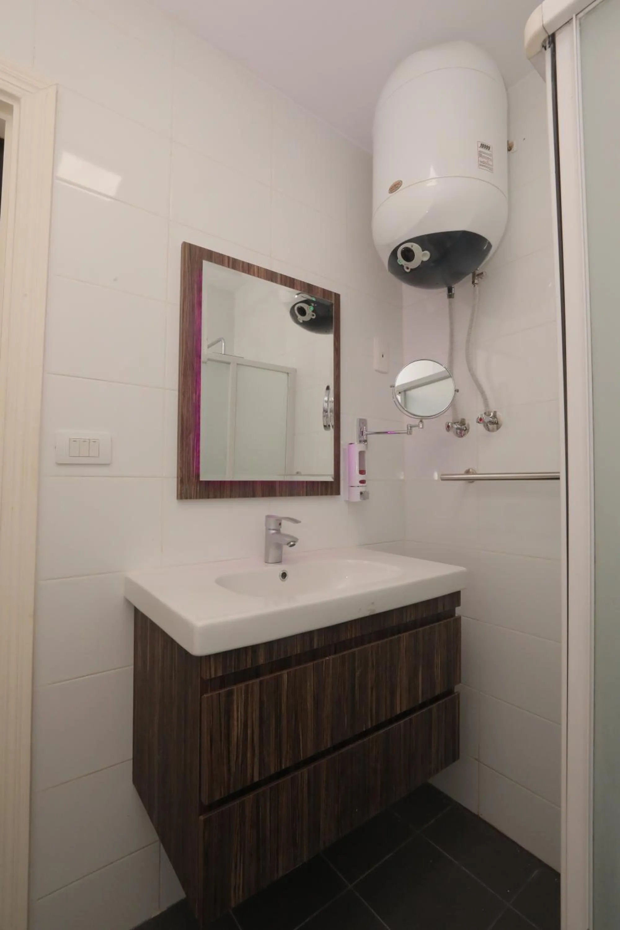 Bathroom in Pyramids Gem Plaza Powered By Look