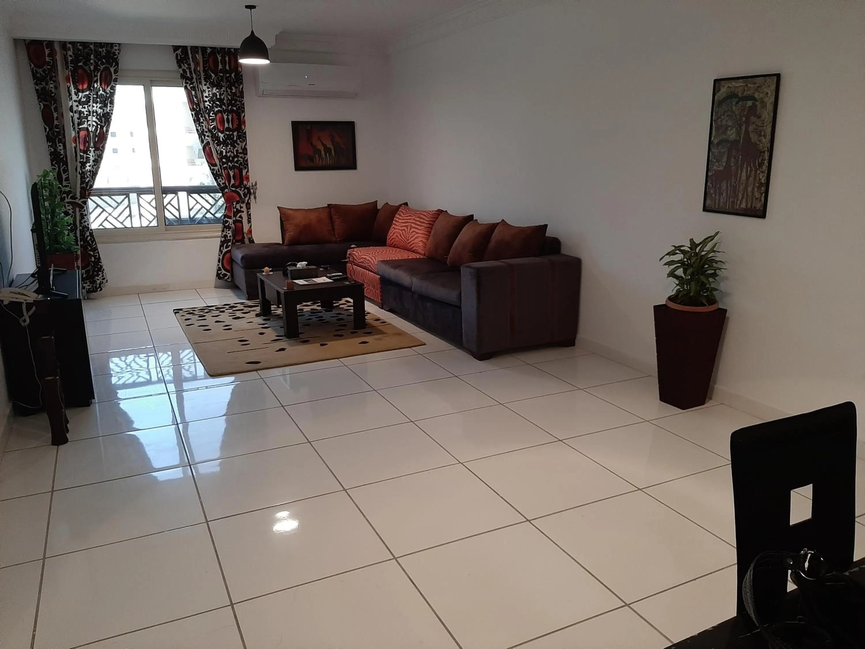 Living room in Pyramids Gem Plaza Powered By Look