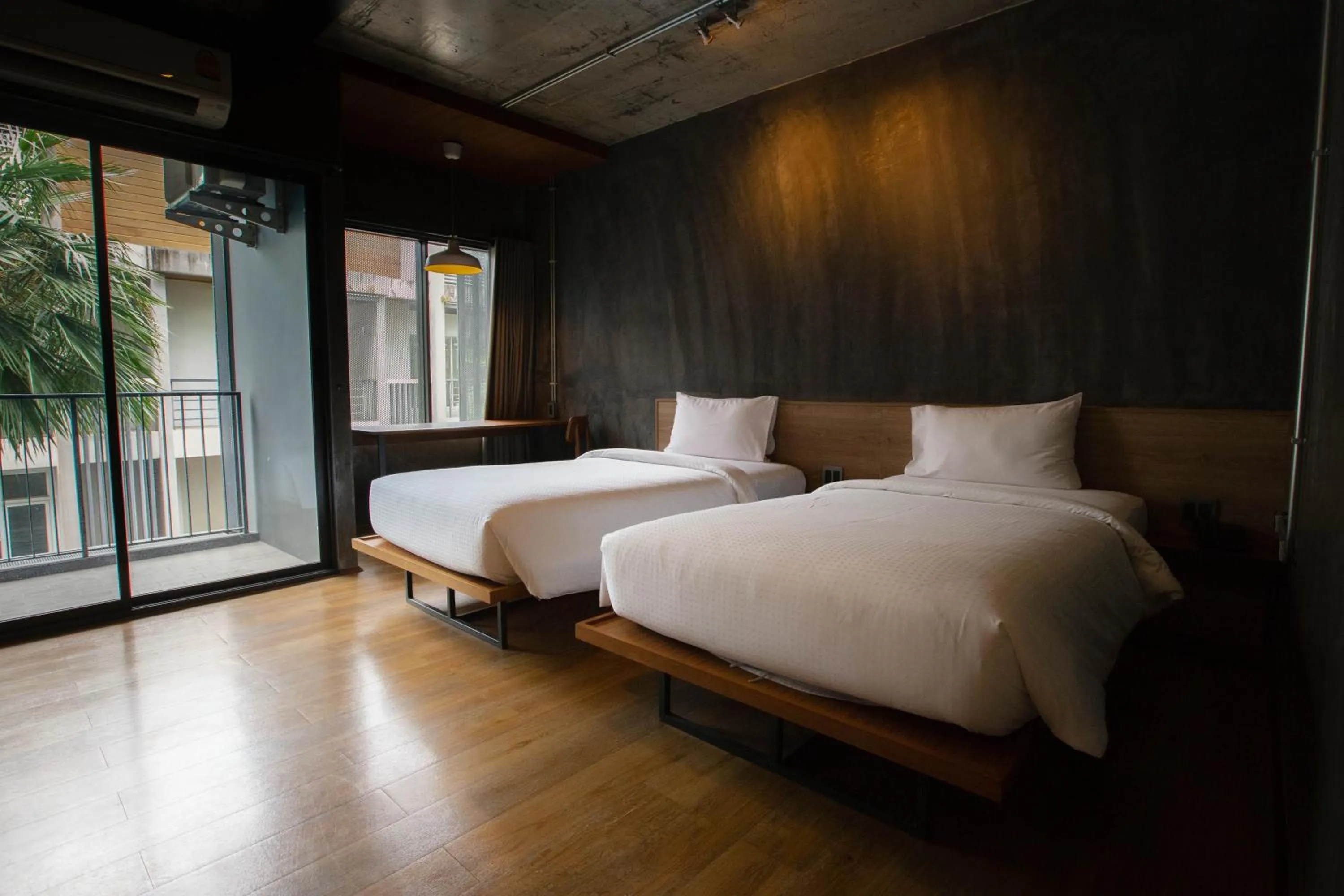 Bed in Navakitel Design Hotel