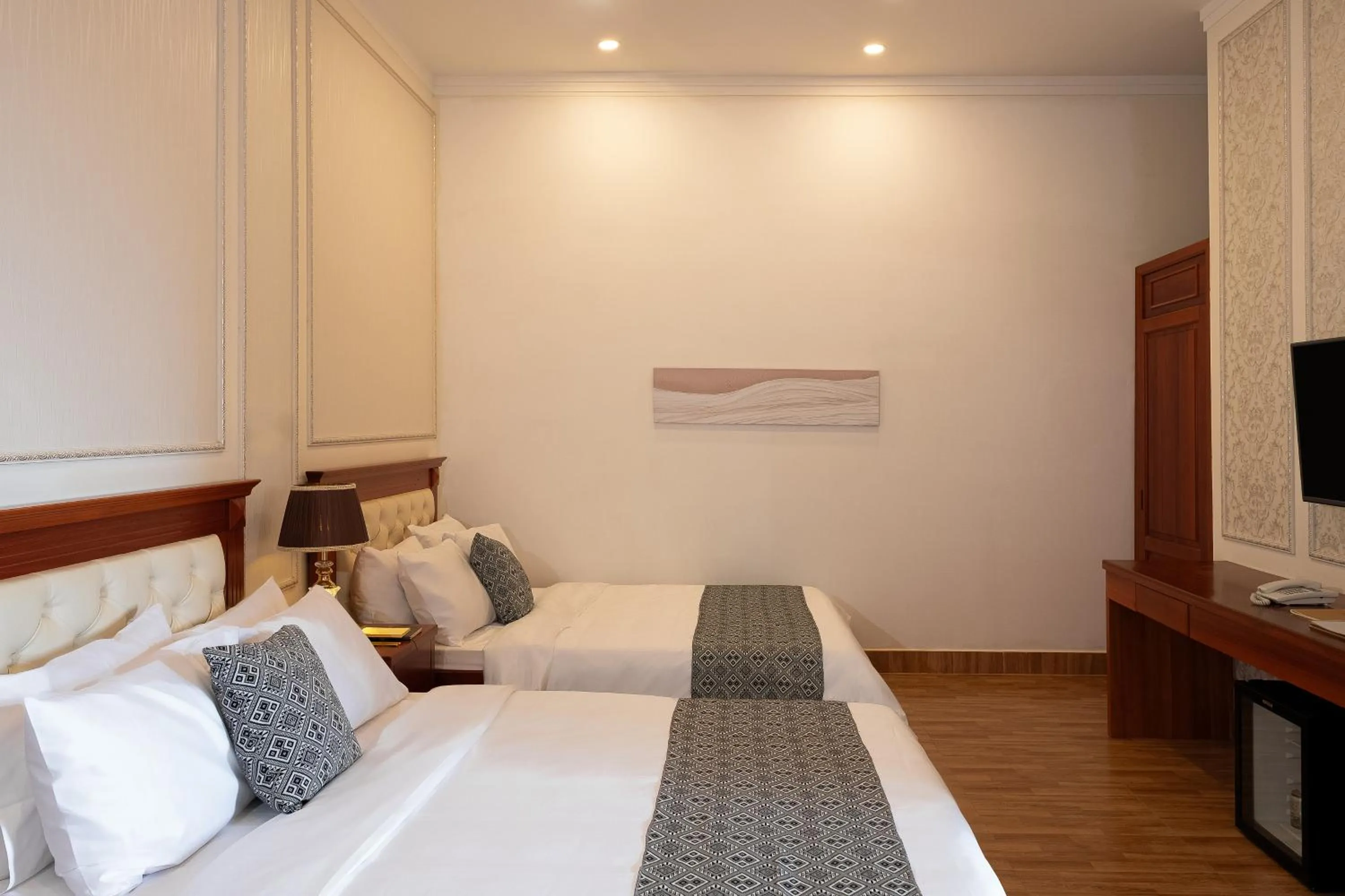 Communal lounge/ TV room, Bed in Mekong Gia Lai Hotel - Me Kong Pleiku