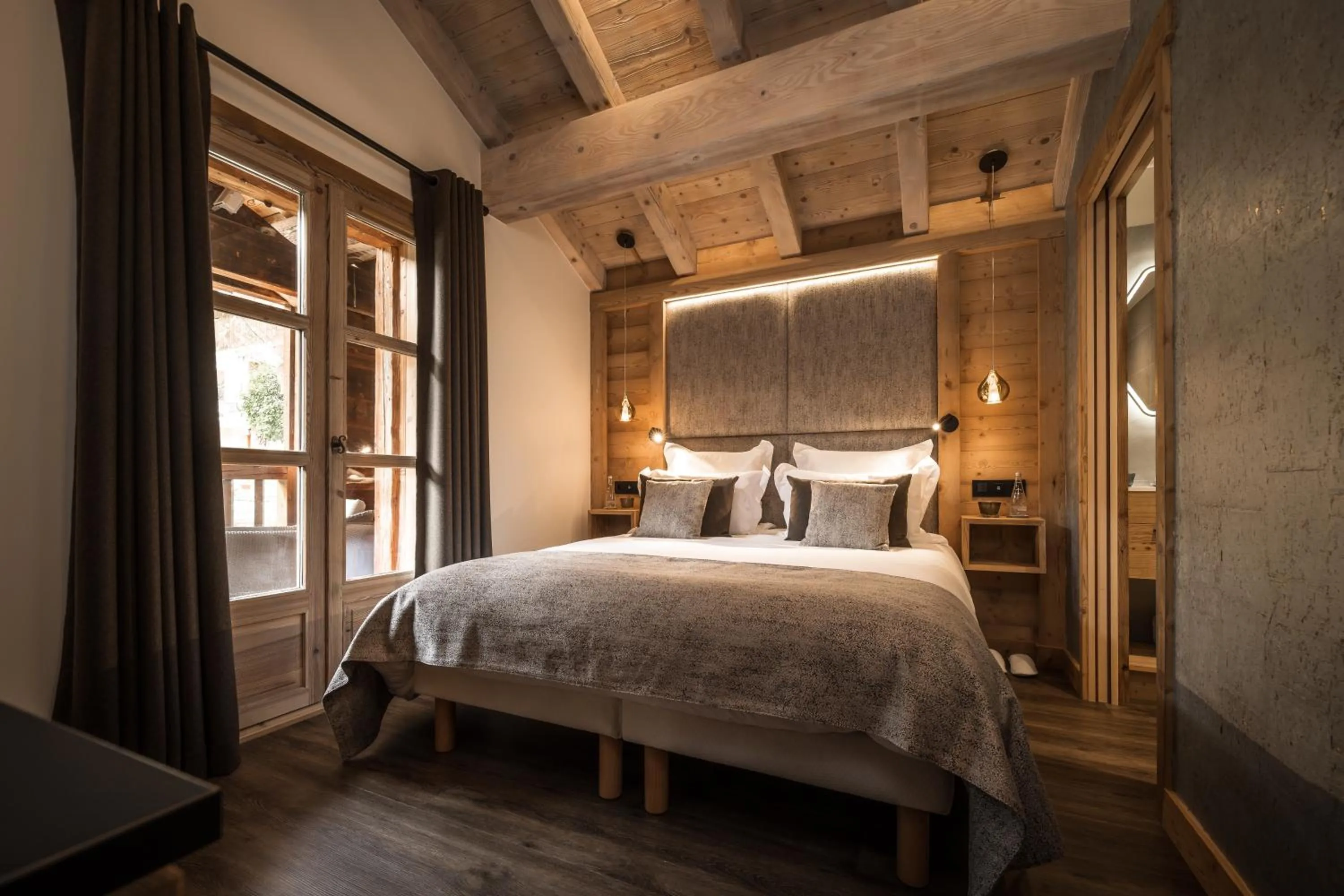 Bedroom in Chalet Jardin d'Angèle Chambres d'hôtes