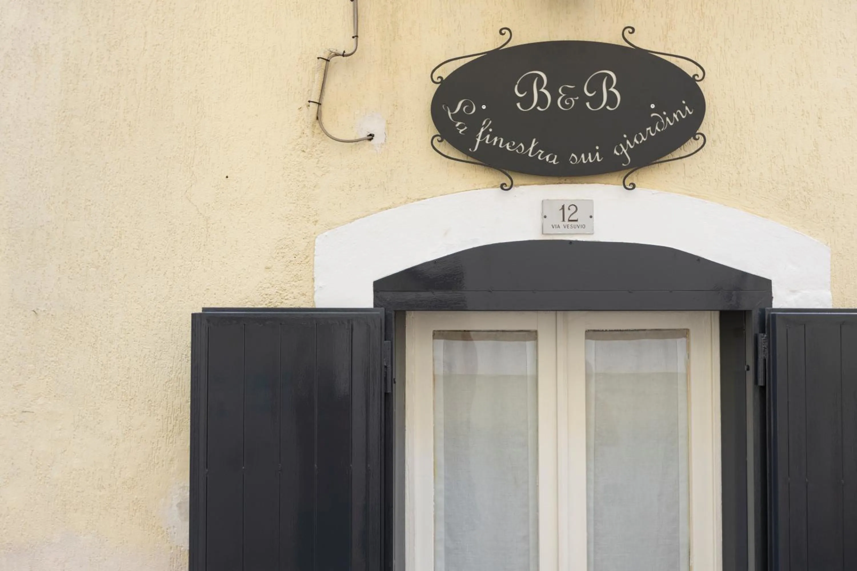 Facade/entrance in B&B La finestra sui Giardini