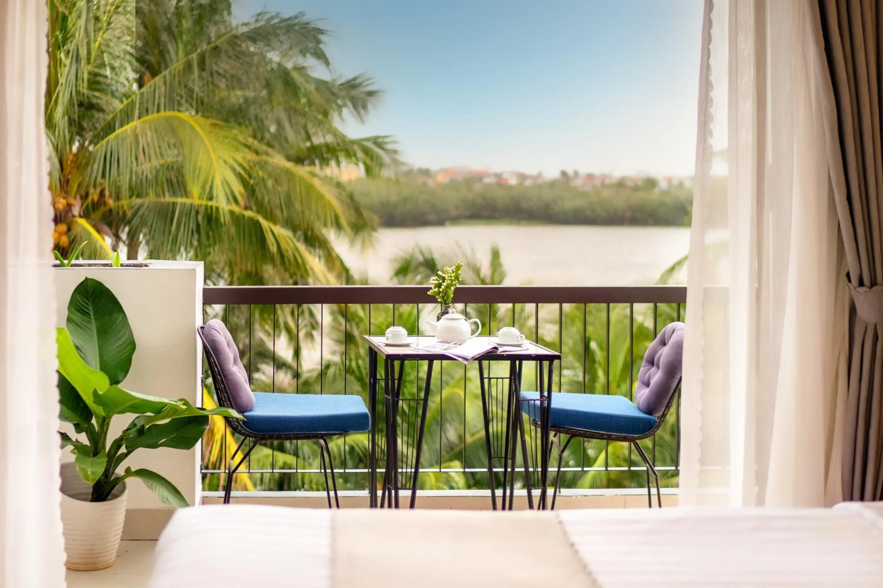 Triple Room with Lake View in Sands River Hoi An Villa Triple Room with Lake View in Sands River Hoi An Villa