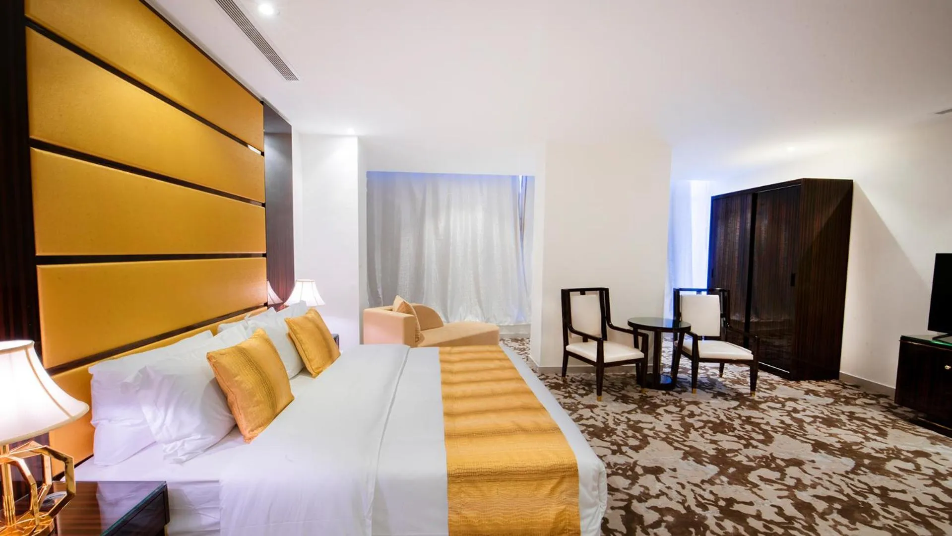 Bed in Golden Dream Hotel