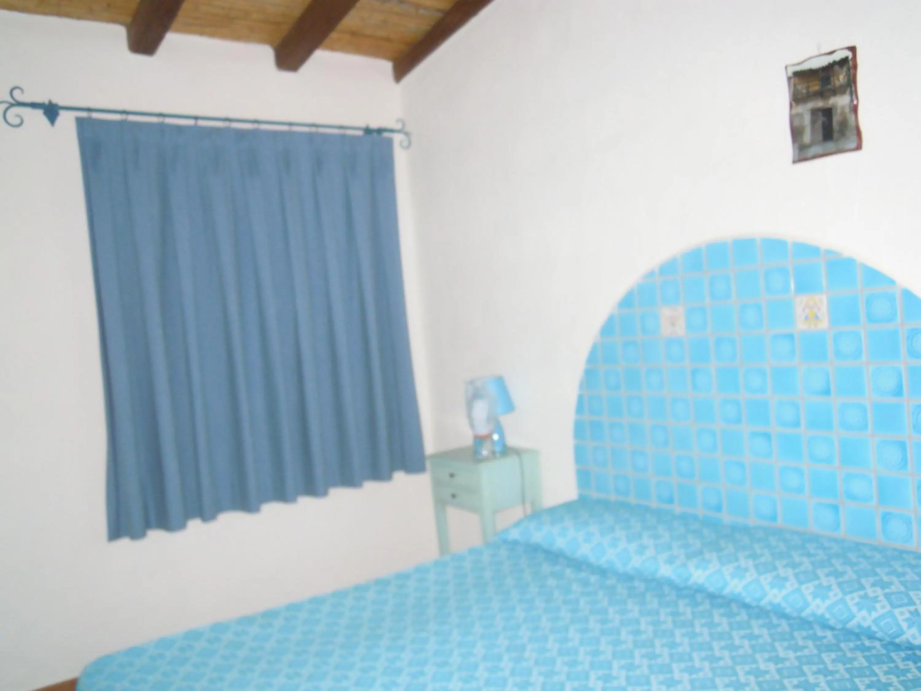 Bed in Agriturismo Camisadu