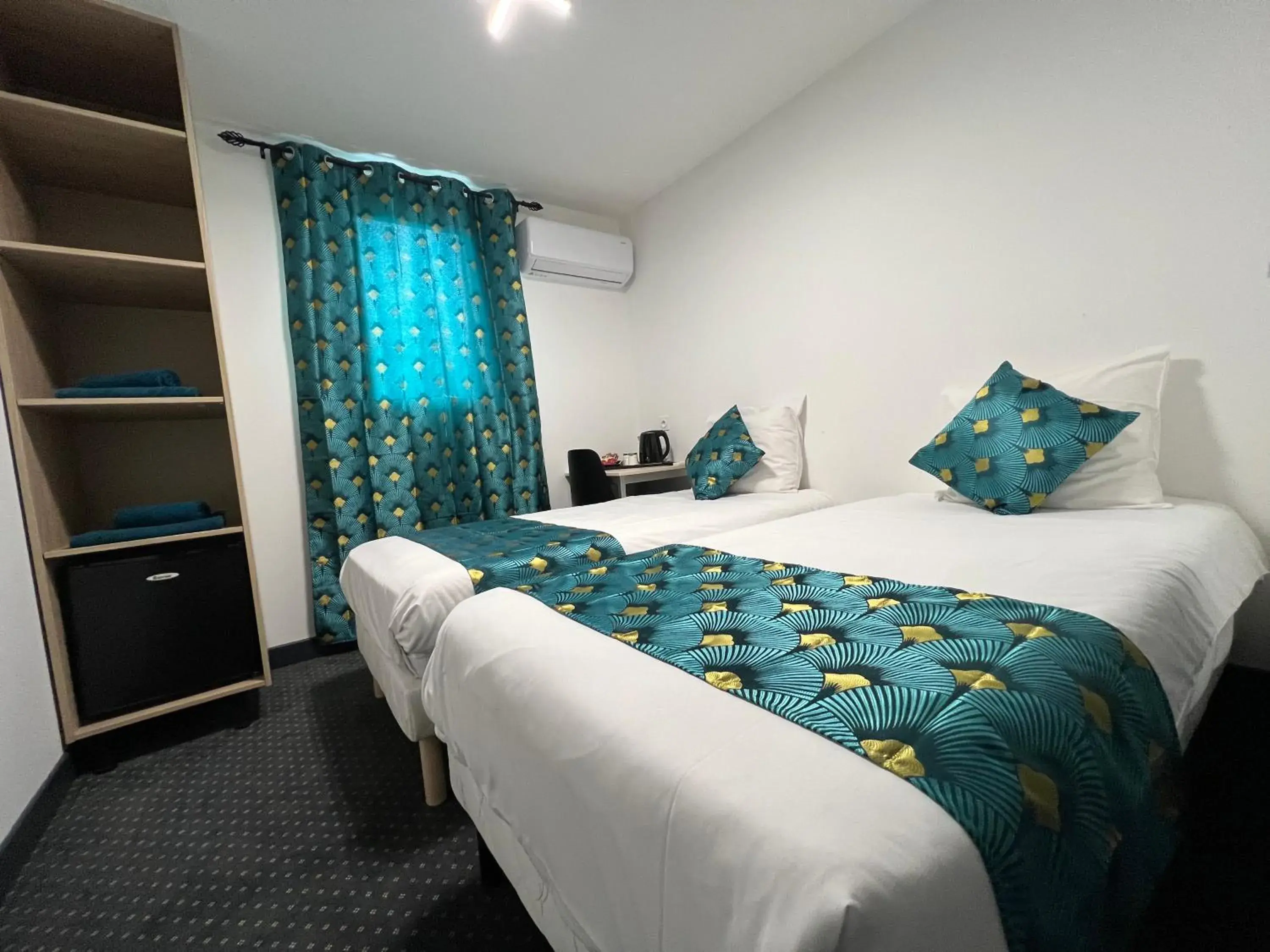 Twin Room with Private Bathroom in HOTEL DE LA PAIX Lyon Sud Givors Twin Room with Private Bathroom in HOTEL DE LA PAIX Lyon Sud Givors