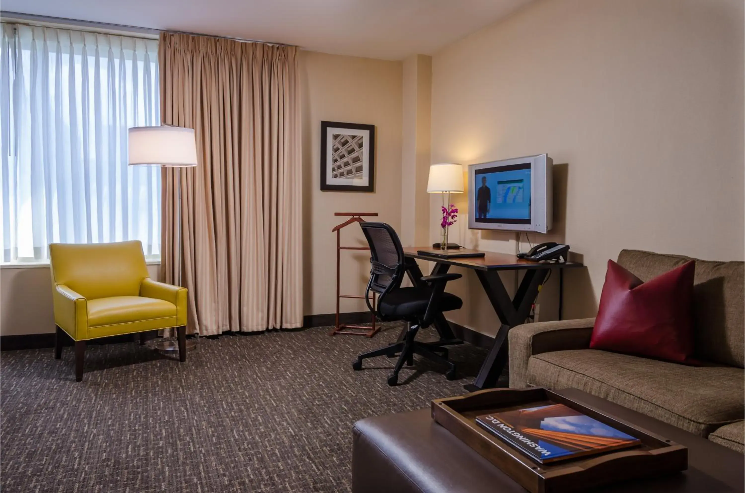 Living room in Beacon Hotel & Corporate Quarters Living room in Beacon Hotel & Corporate Quarters