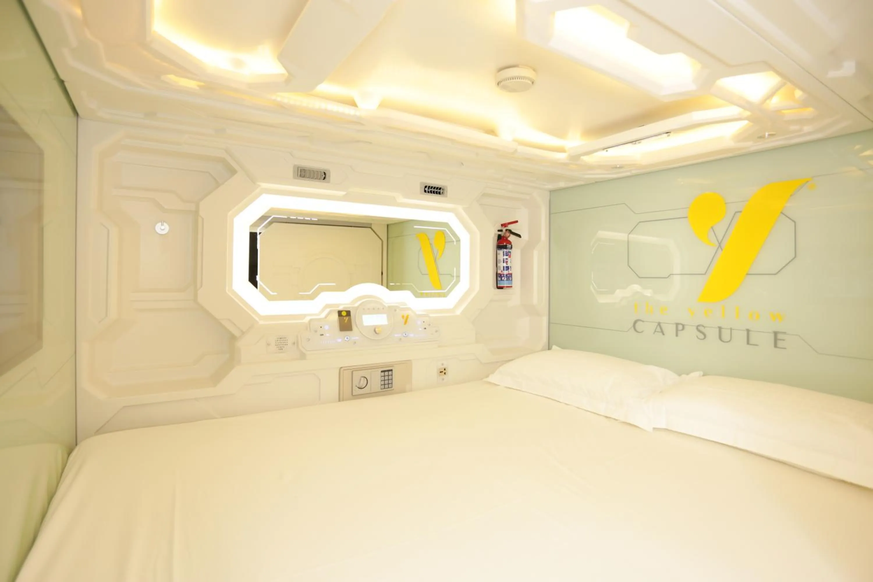 Bed in The Yellow Capsule Cancun Close to Airport