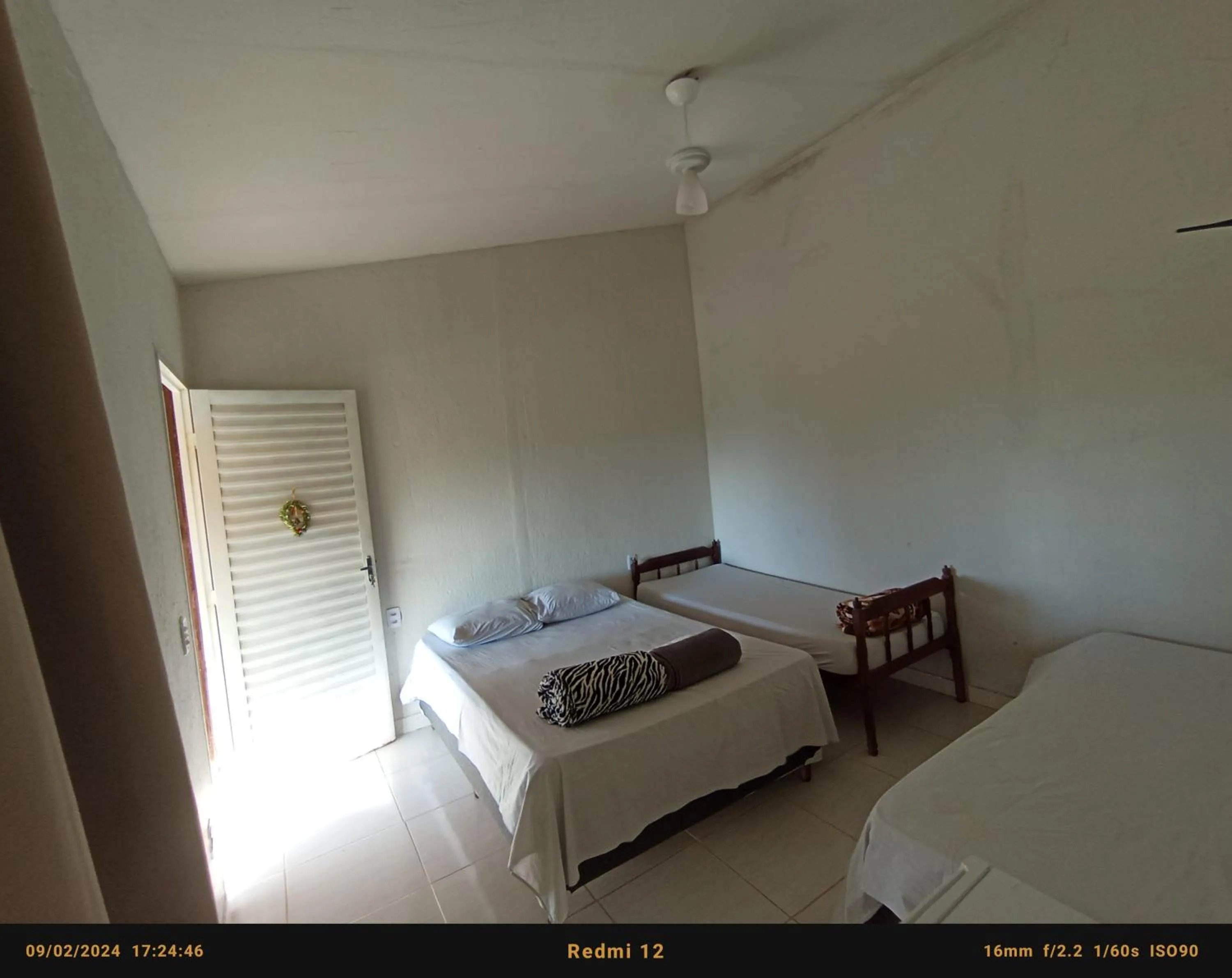 Bed in Pousada flores de ipê