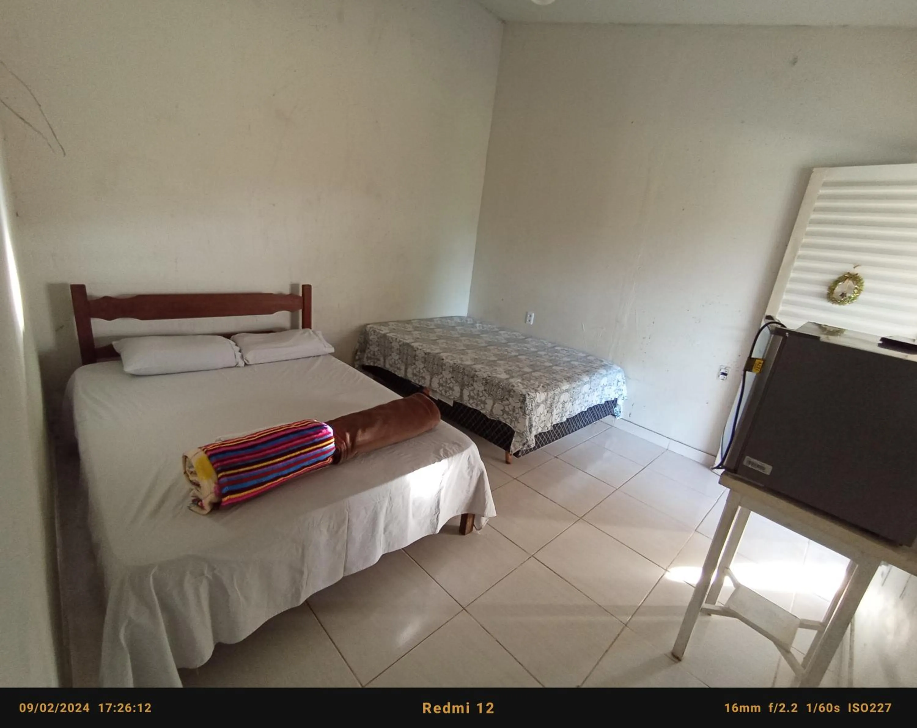 Bed in Pousada flores de ipê