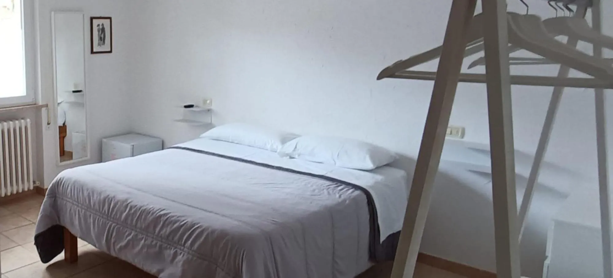 Bed in Hotel Villa Cesare B&B