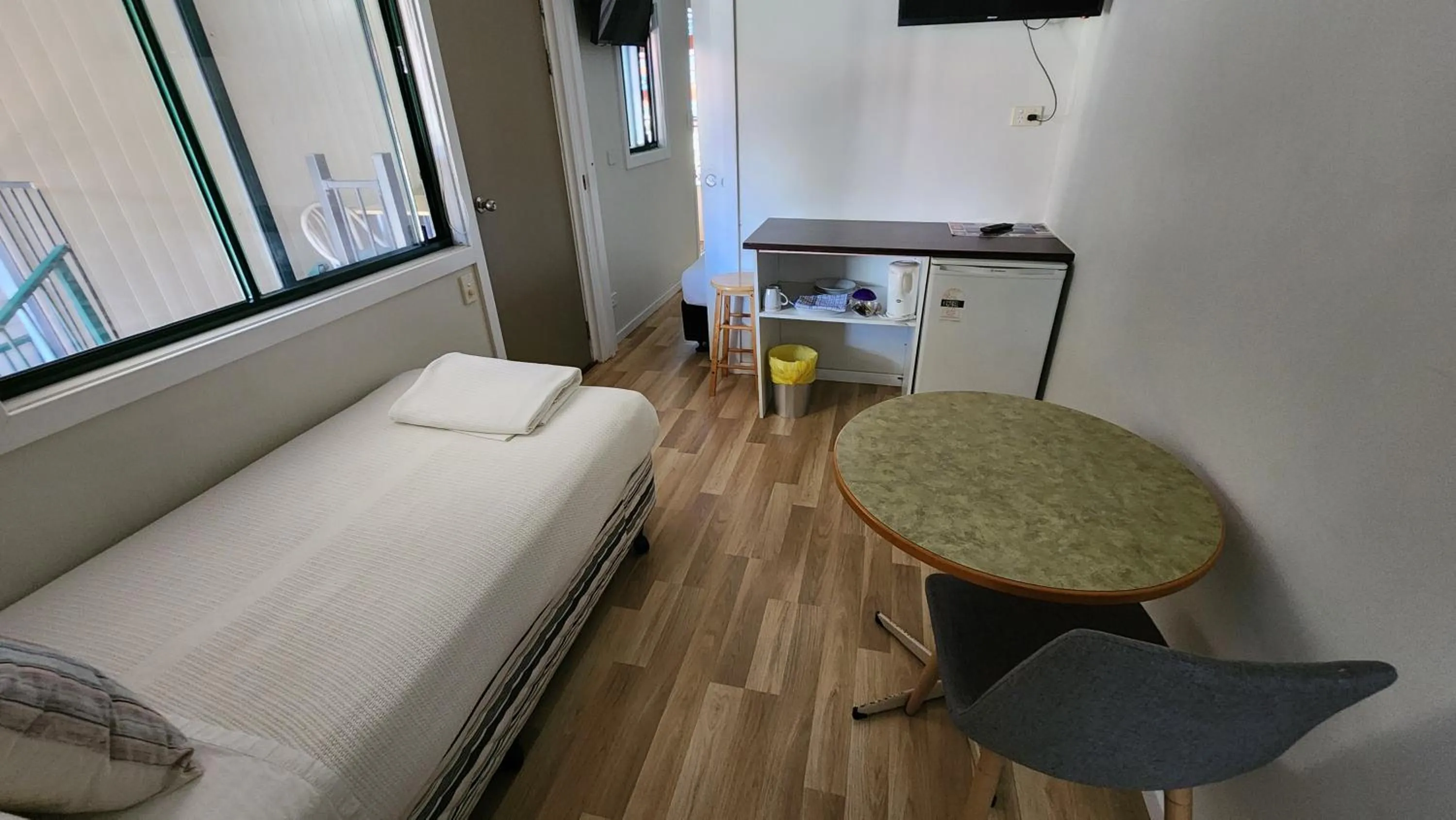 Bed in T's Resort & Motel