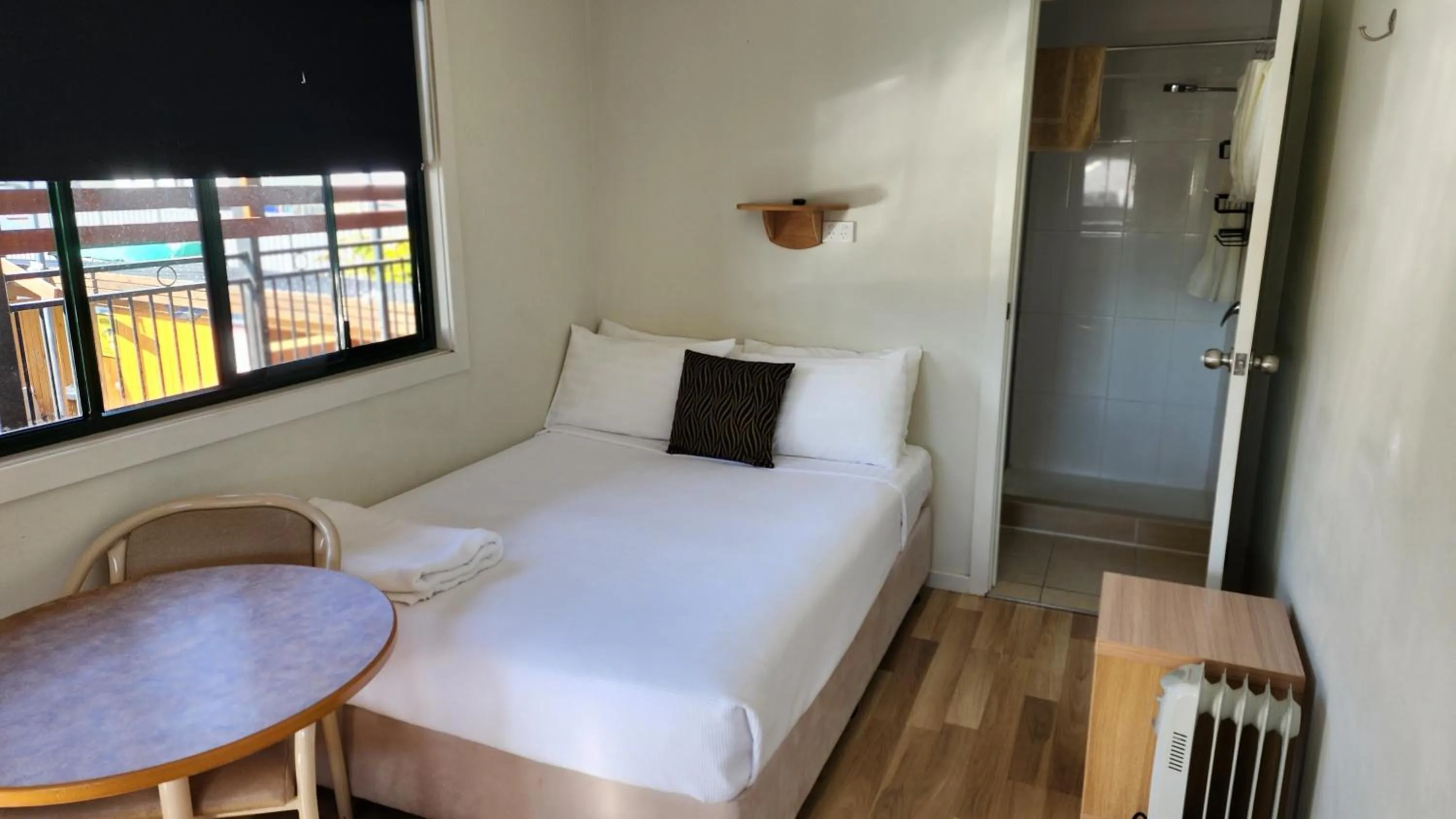 Bed in T's Resort & Motel