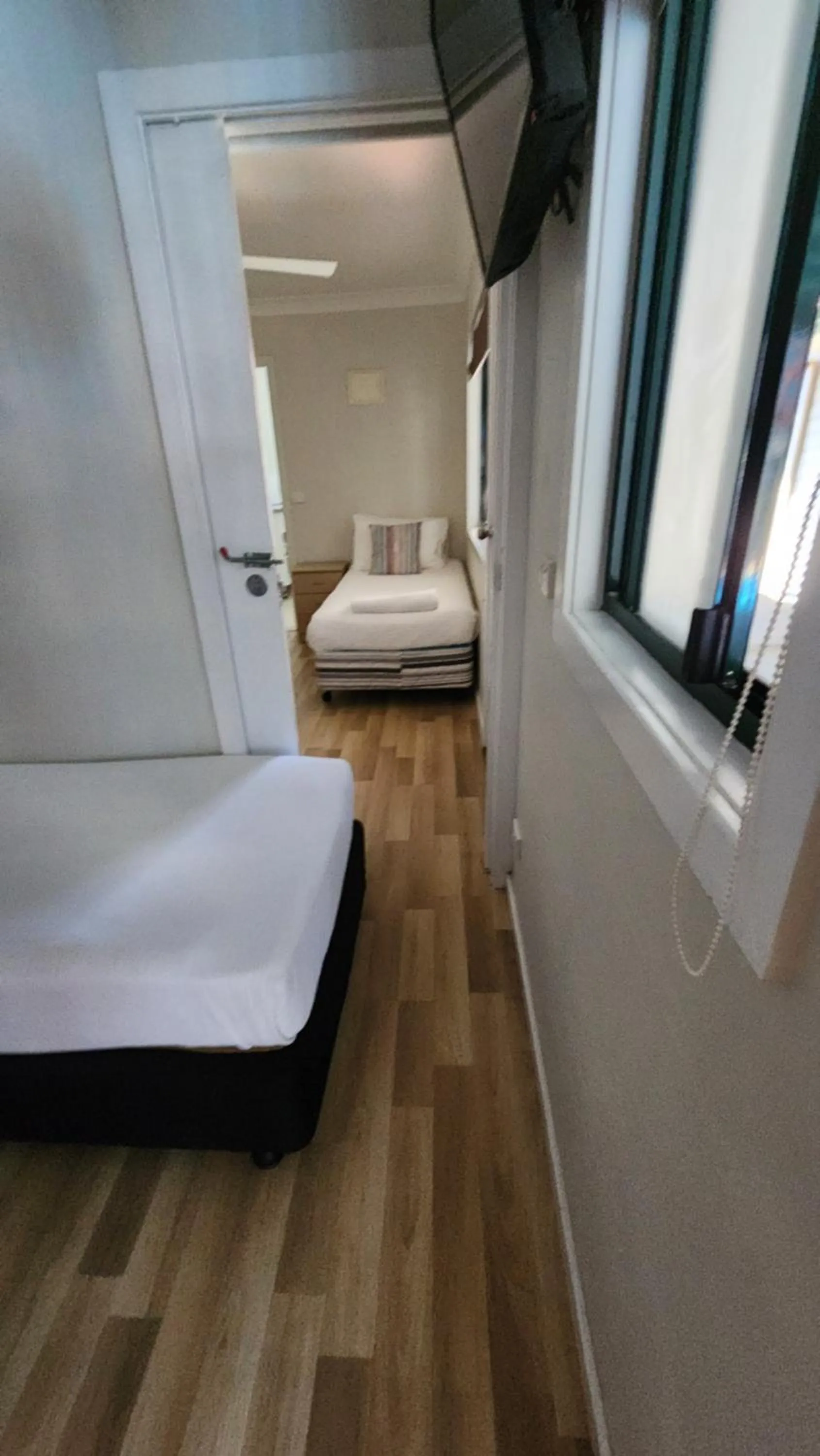 Bed in T's Resort & Motel