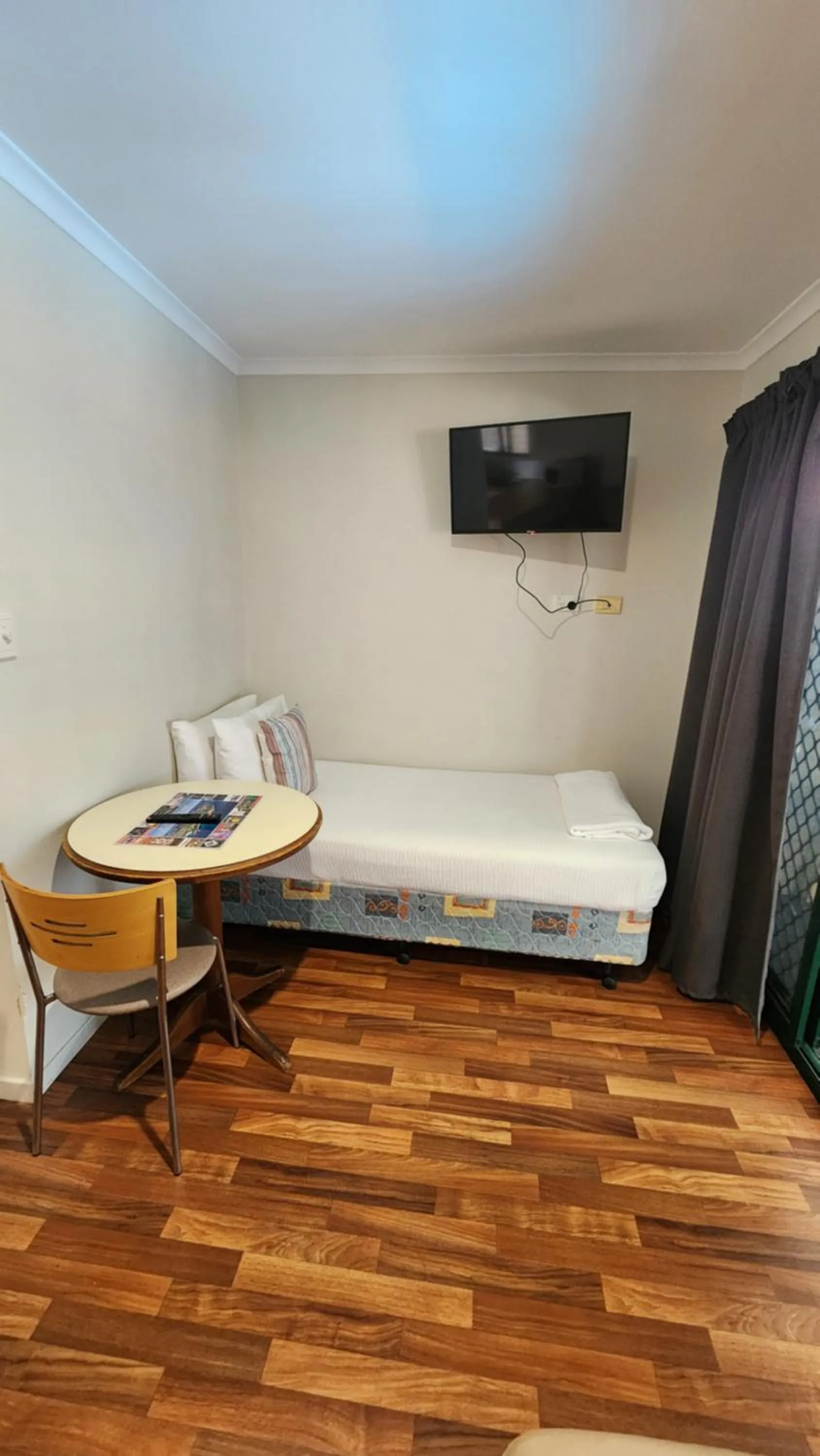 Bed in T's Resort & Motel