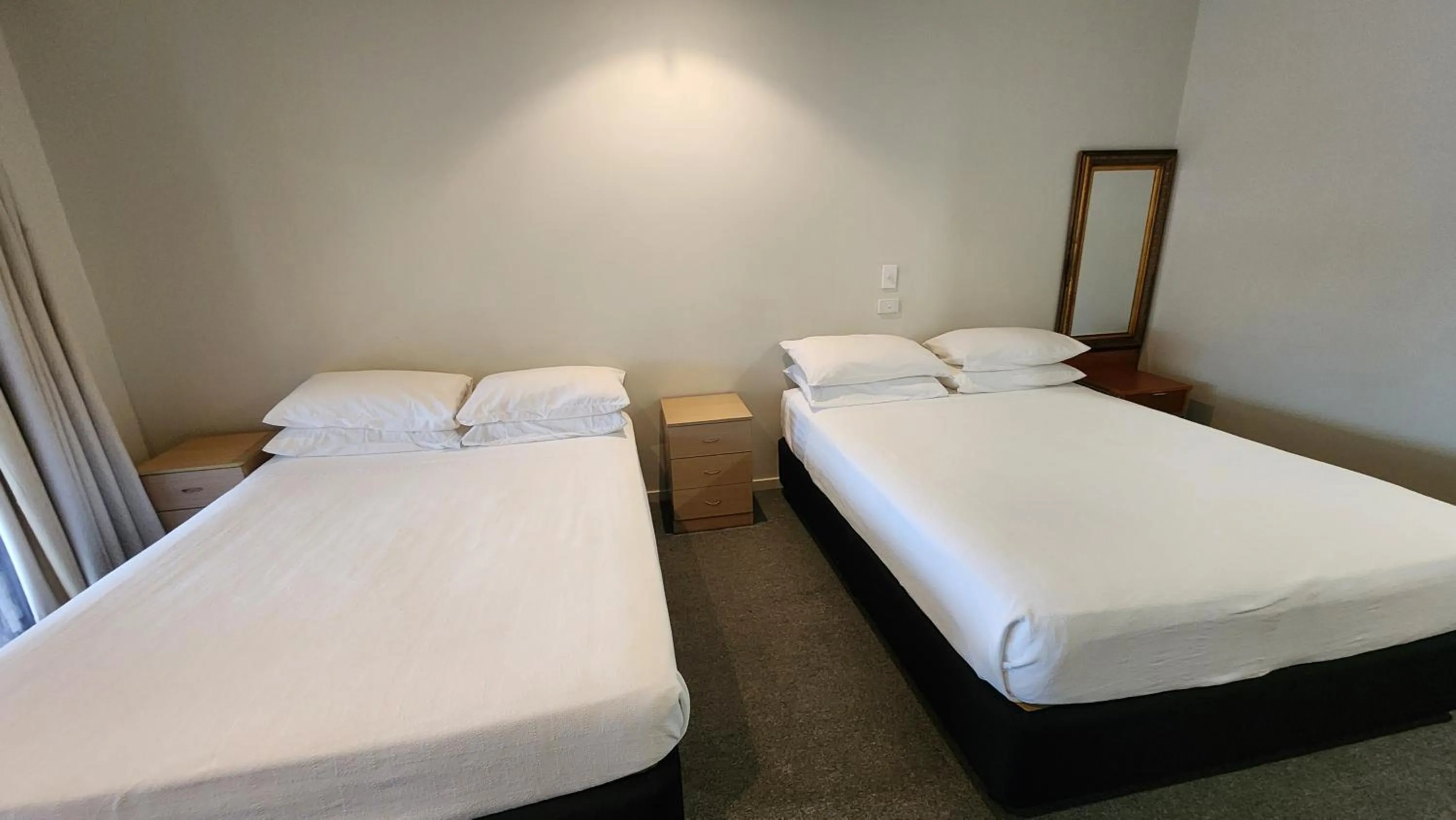 Bed in T's Resort & Motel