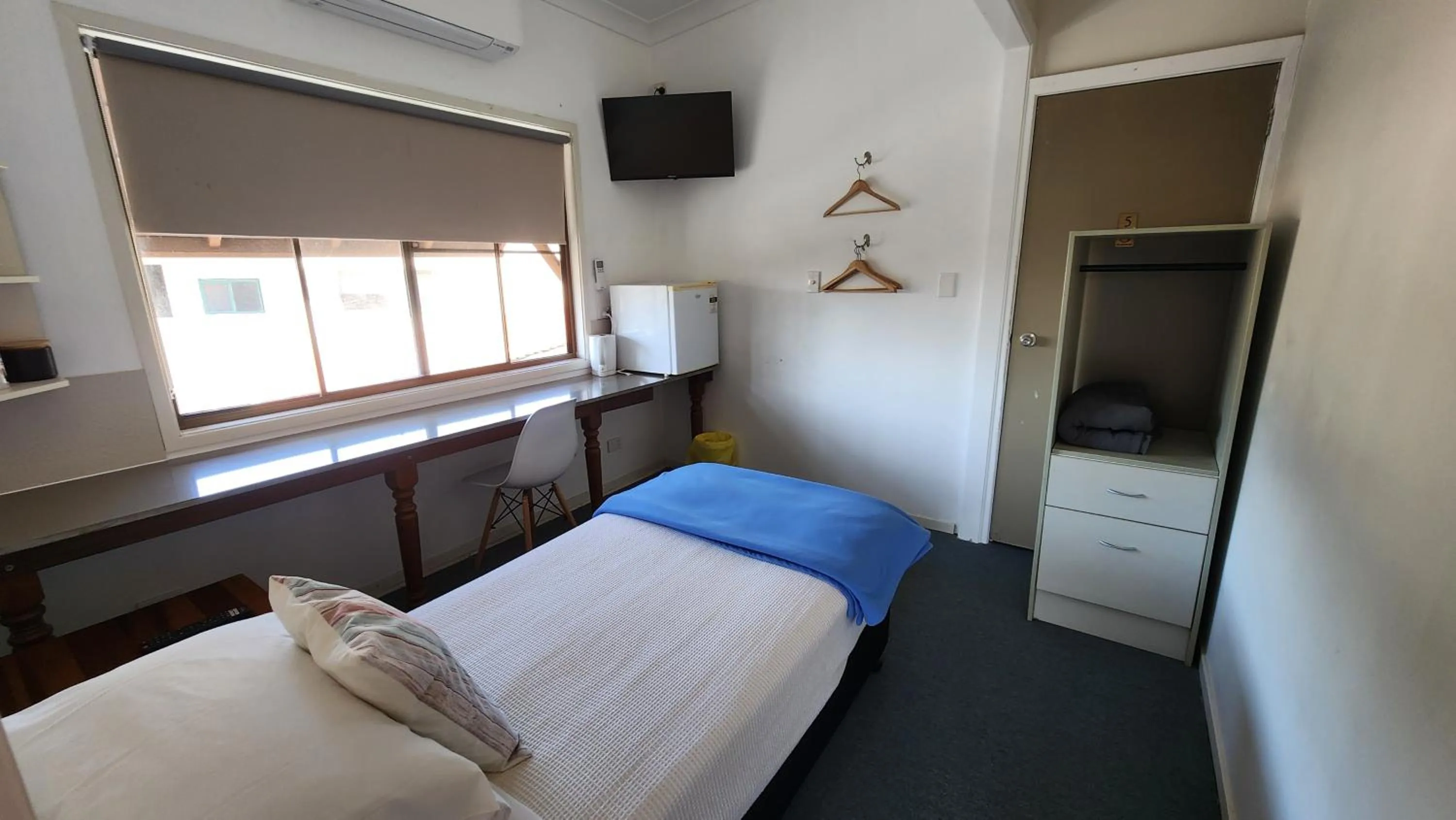 Bed in T's Resort & Motel