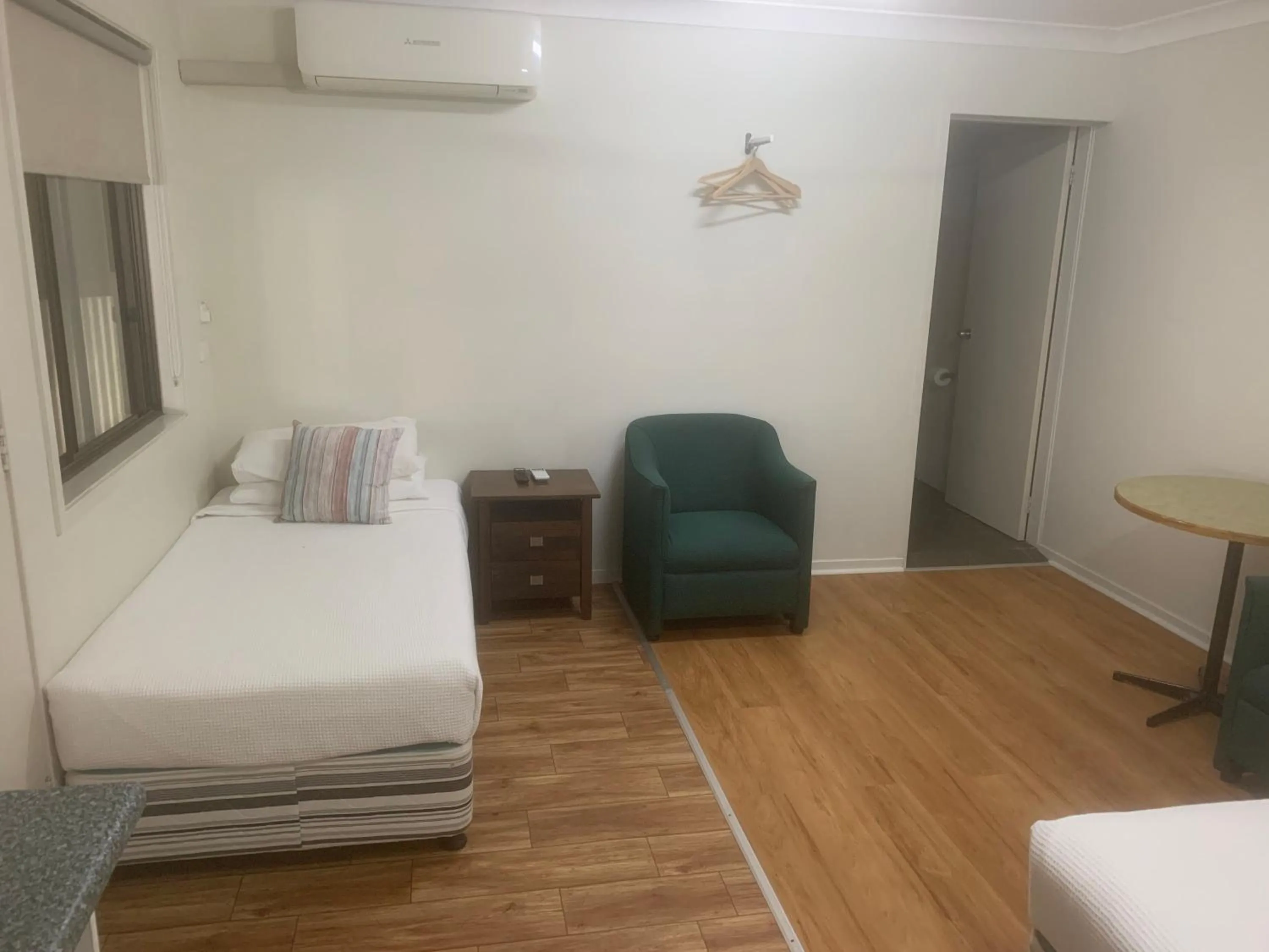 Bed in T's Resort & Motel