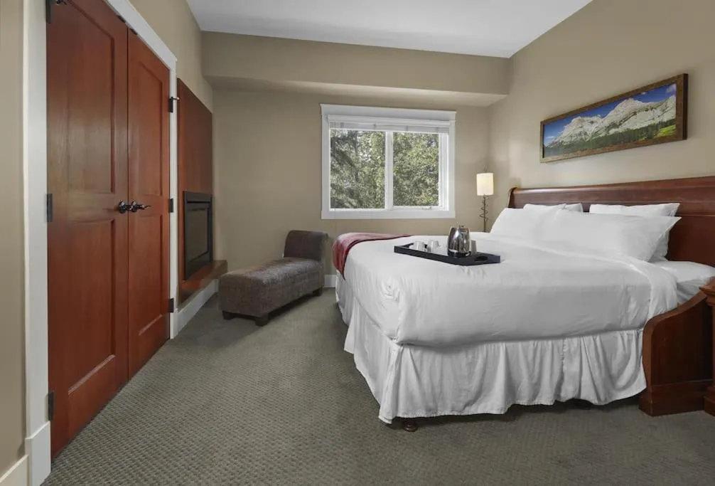 Bed in Star Suite -Luxurious condo with 3 fireplaces, and open Pool!