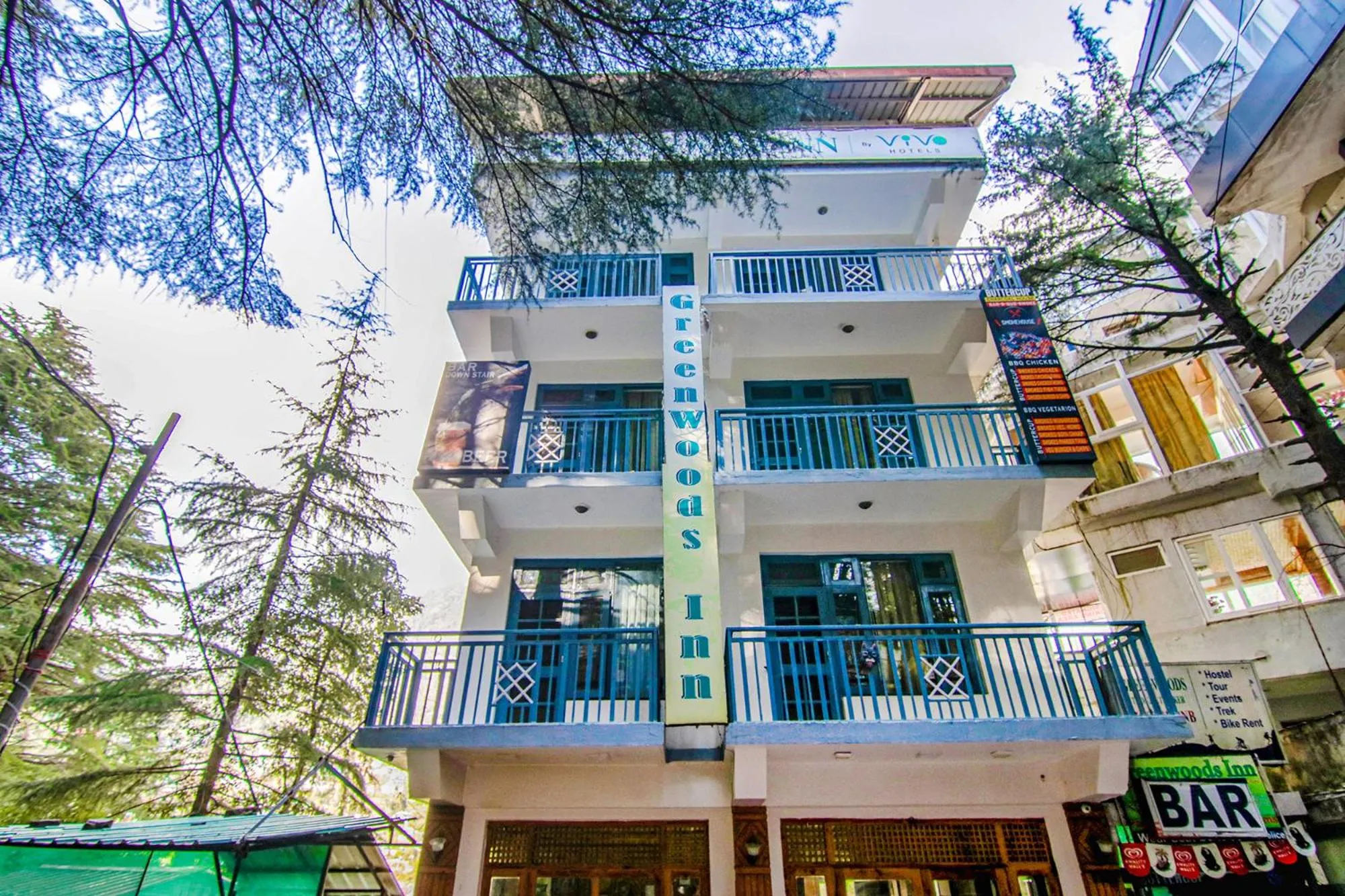 Property building in Greenwoods Inn Mcleodganj #Parking #lift #All Balcony Rooms #Rooftop Terrace #Prime Location # Close to the Triund Trek Point 400 Mtr Head