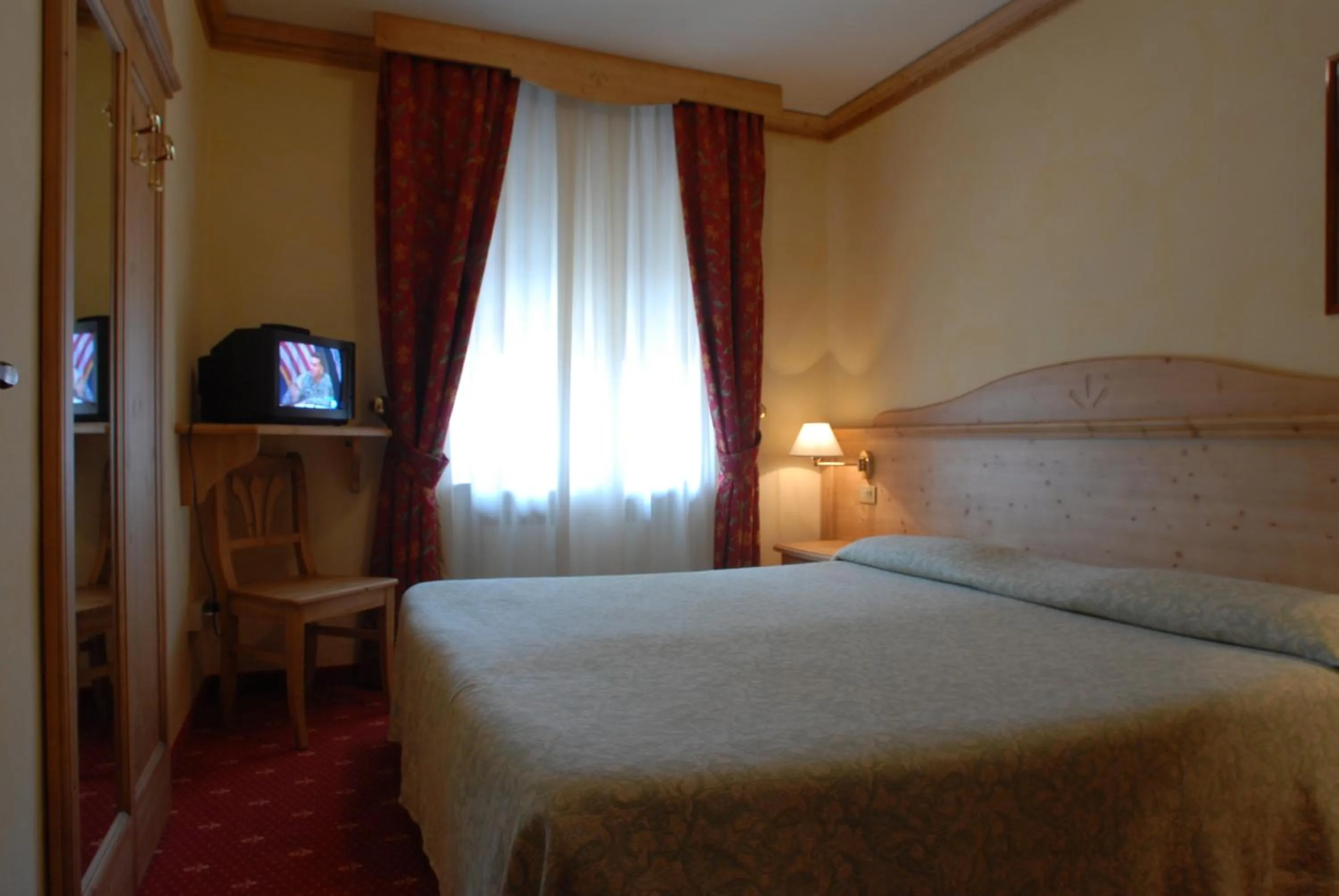 Decorative detail, Bed in Hotel Alpi - Foza