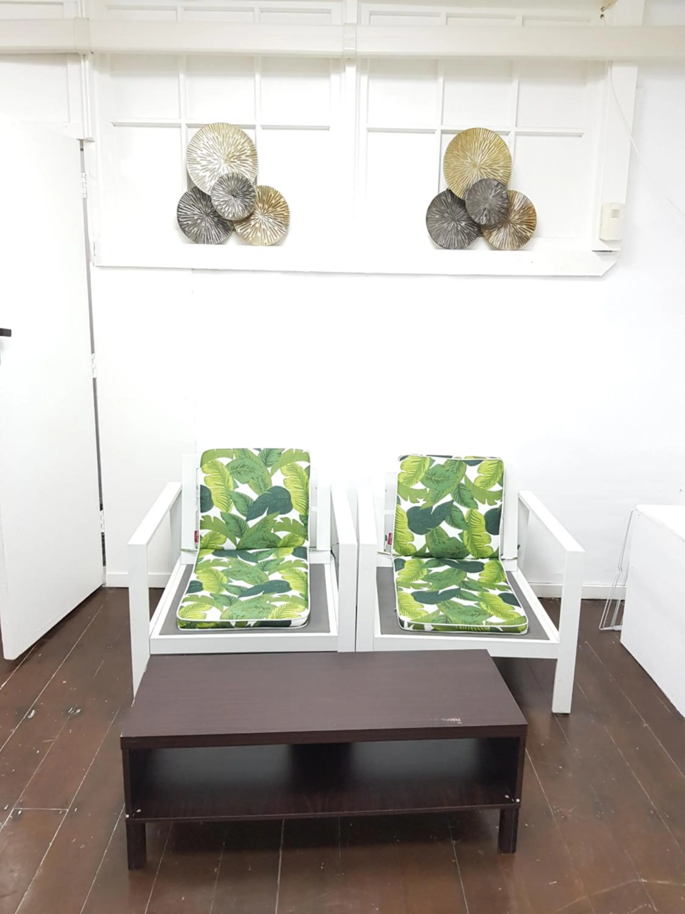 Communal lounge/ TV room in HIT Hostel