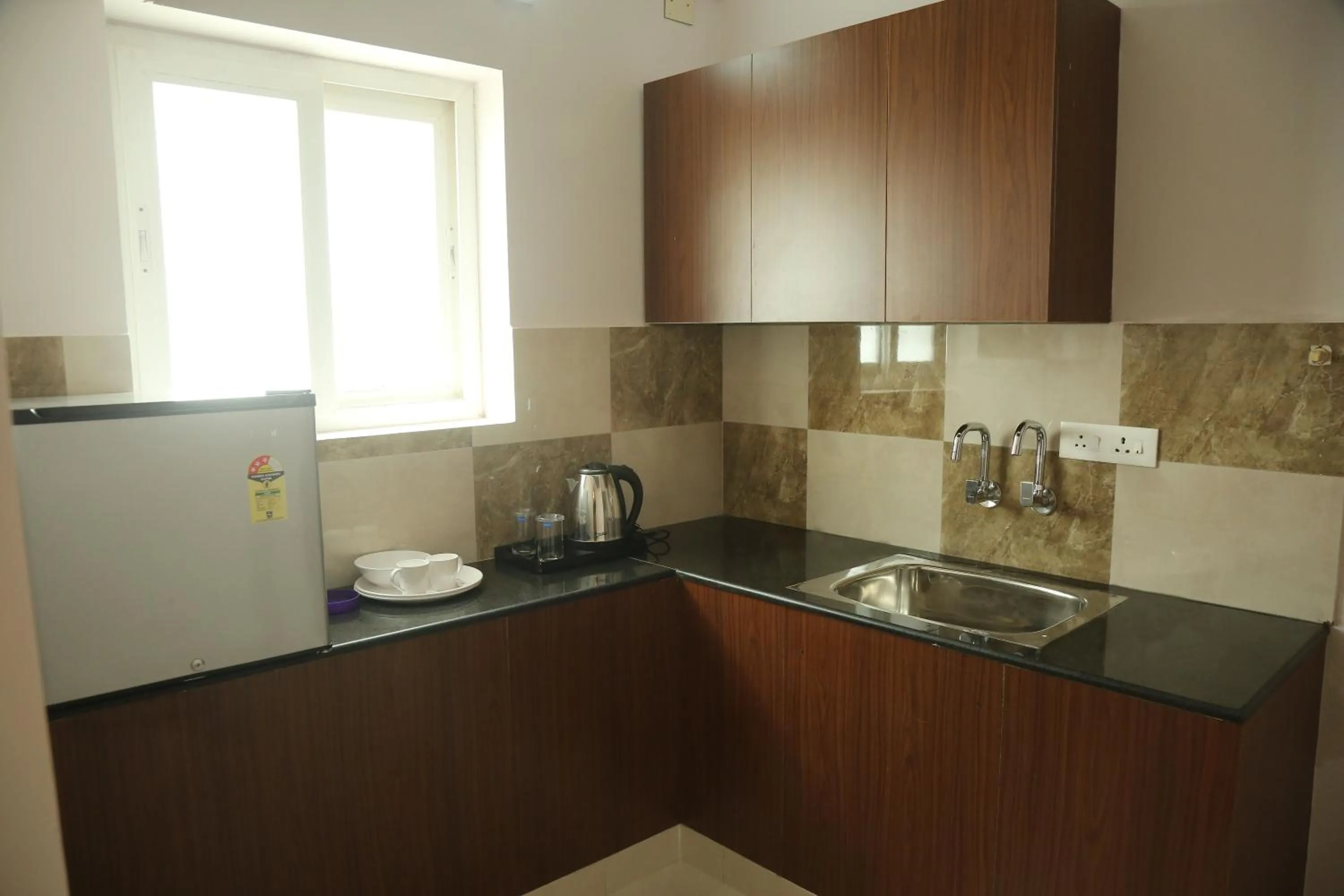Coffee/tea facilities in Kfour Apartment & Hotels Private Limited