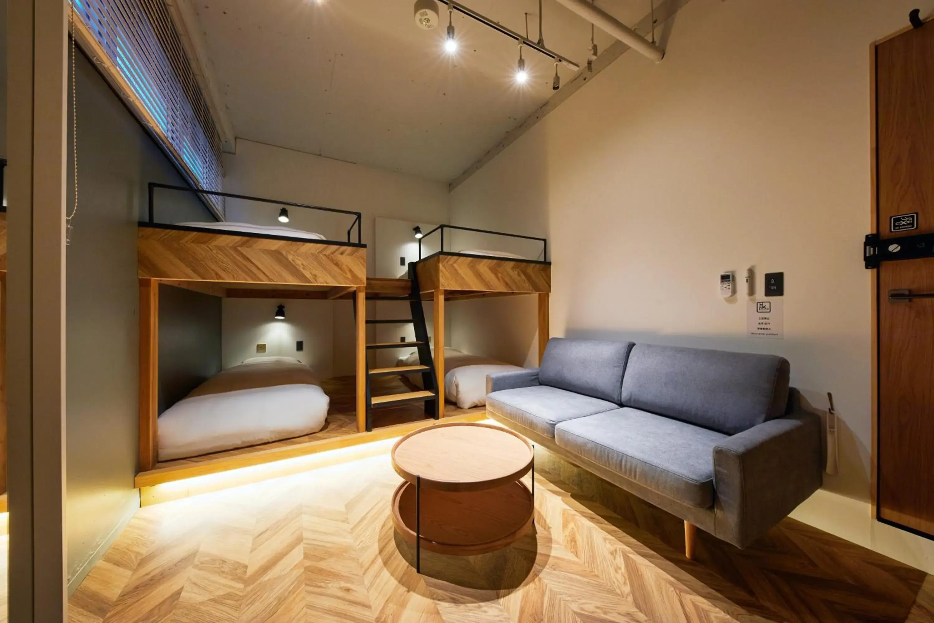 Seating area, Bed in mizuka Daimyo 6 - unmanned hotel - Seating area, Bed in mizuka Daimyo 6 - unmanned hotel -