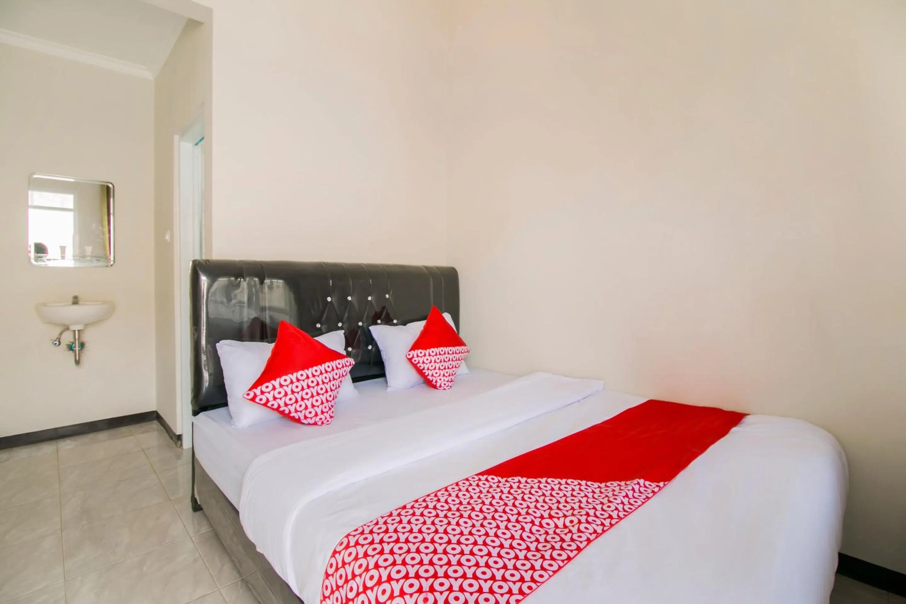 Bedroom in Hotel O Fakhira Residence