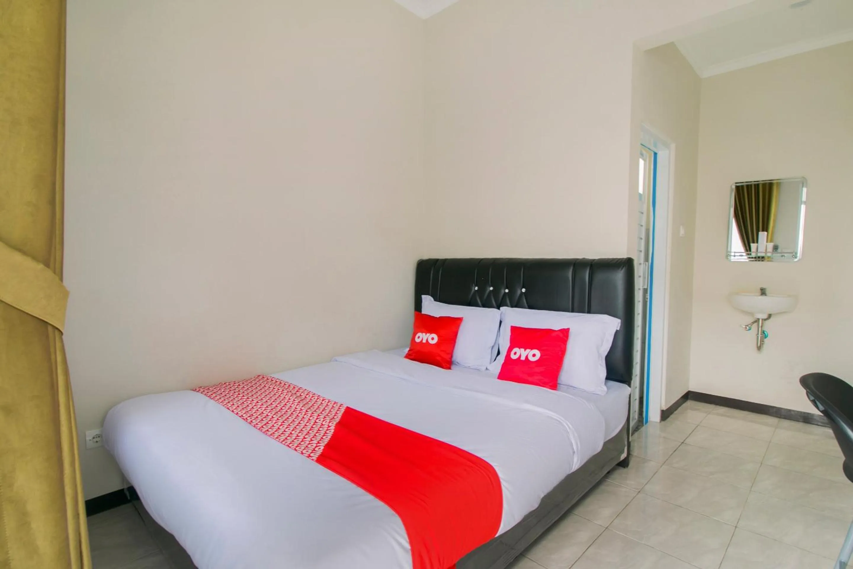 Bedroom in Hotel O Fakhira Residence