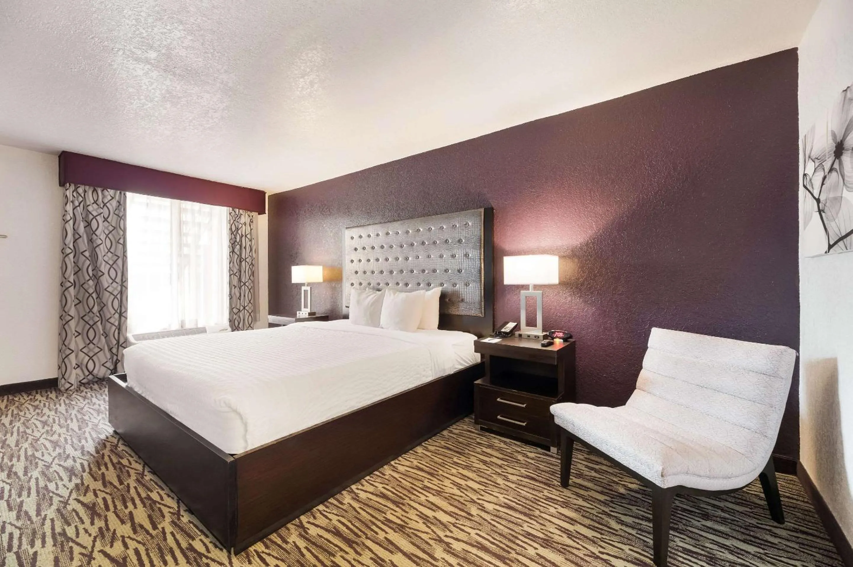 Bedroom, Bed in Clarion Inn & Suites Across From Universal Orlando Resort